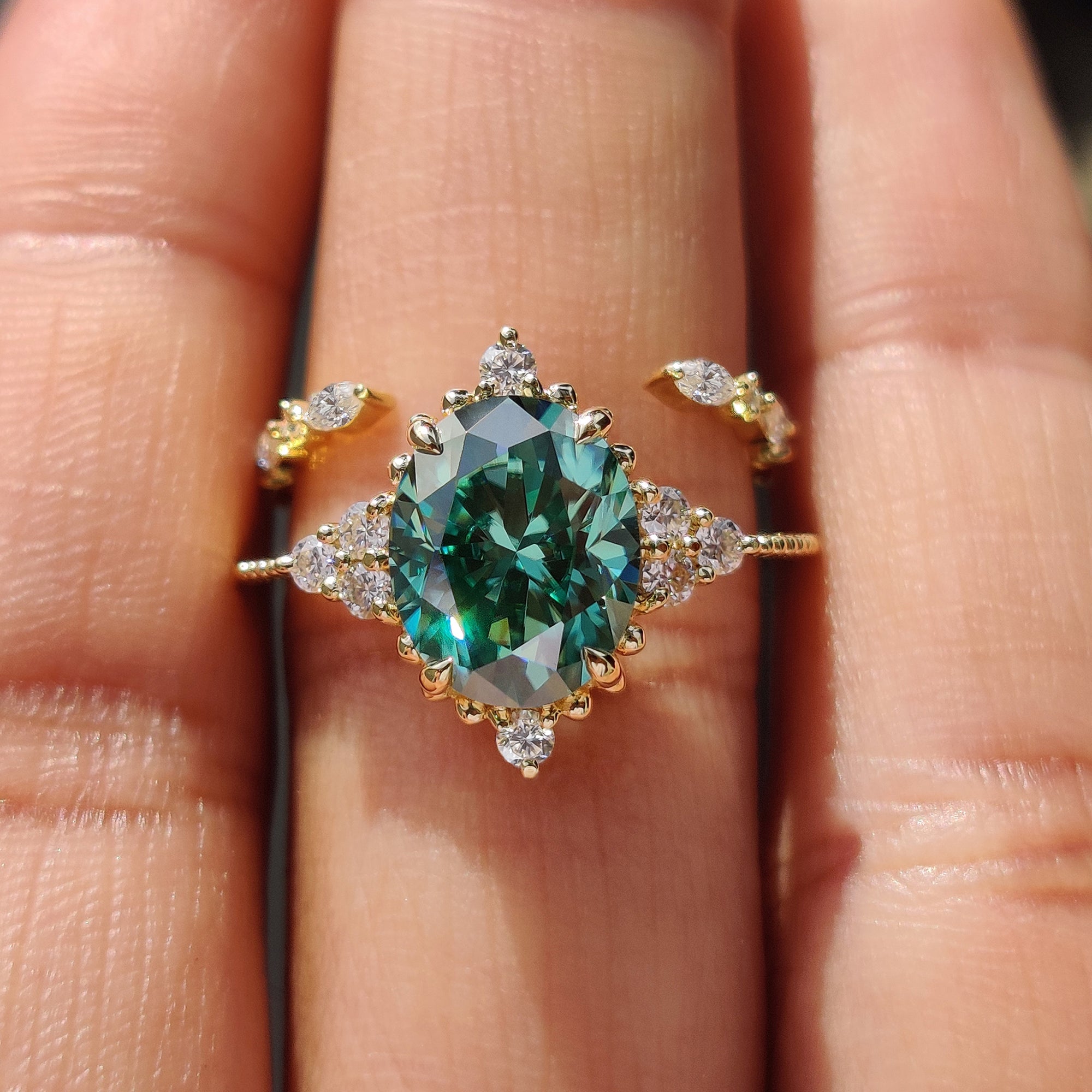 Oval and round cut ring paired with a milgrain setting in a handmade bridal set.
