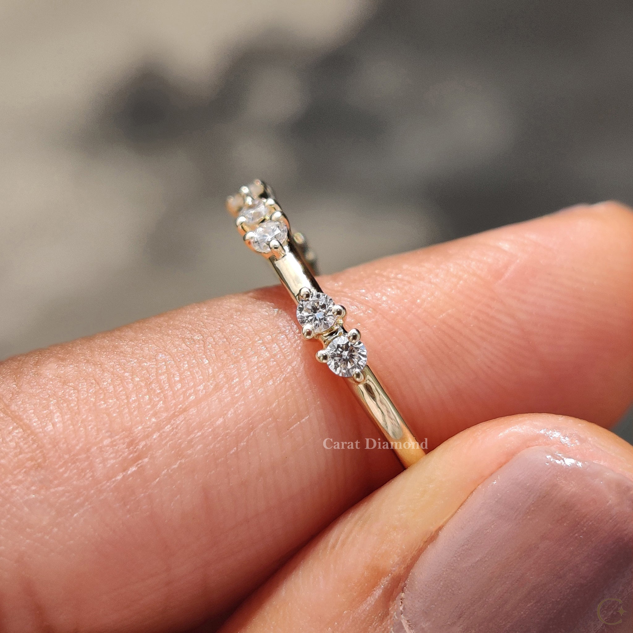 Carat Diamonds simple wedding band featuring IGI certified diamonds.
