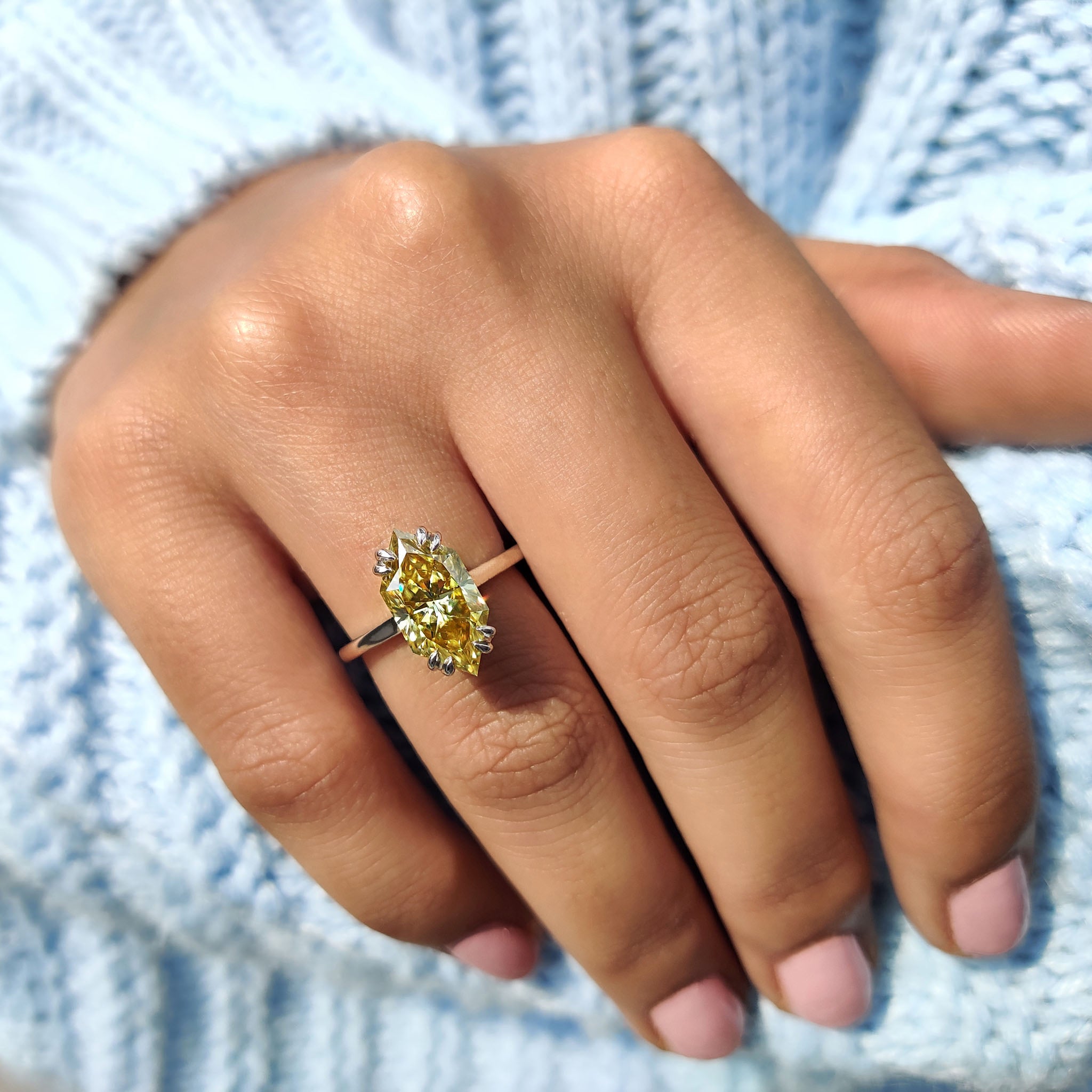 Gold proposal ring to make your moment even more special.
