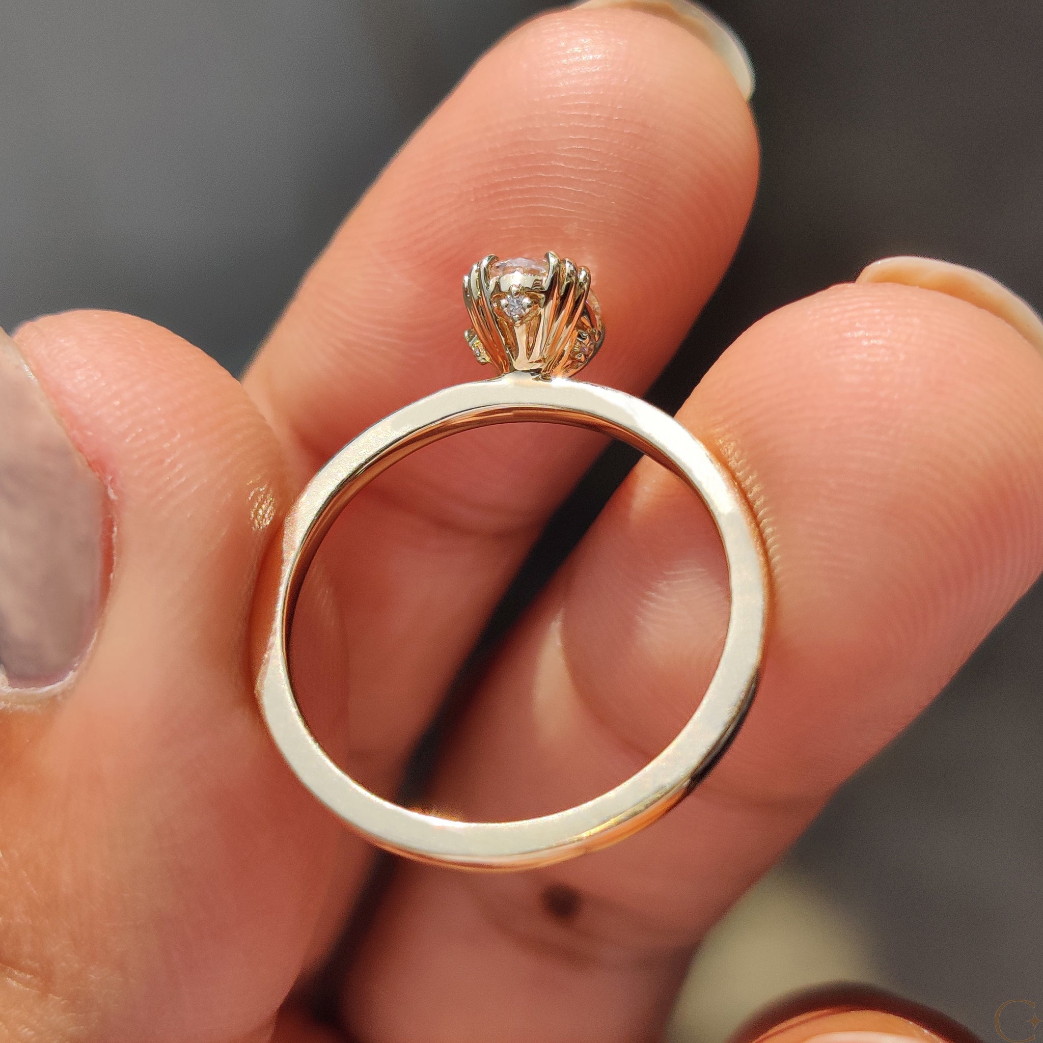 Carat Diamonds ring showcasing an oval shaped diamond.
