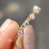Half eternity band made in yellow gold.