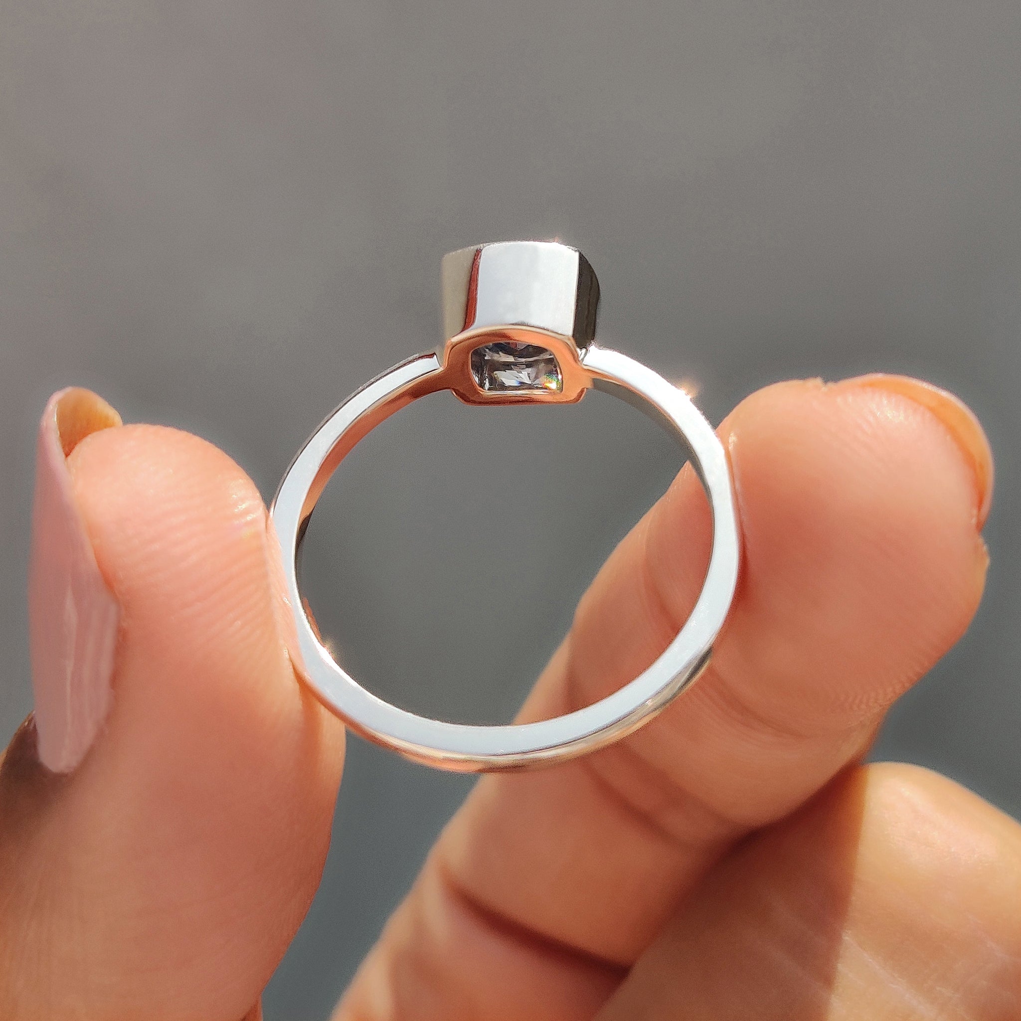 Moissanite engagement ring shines bright with lasting grace.
