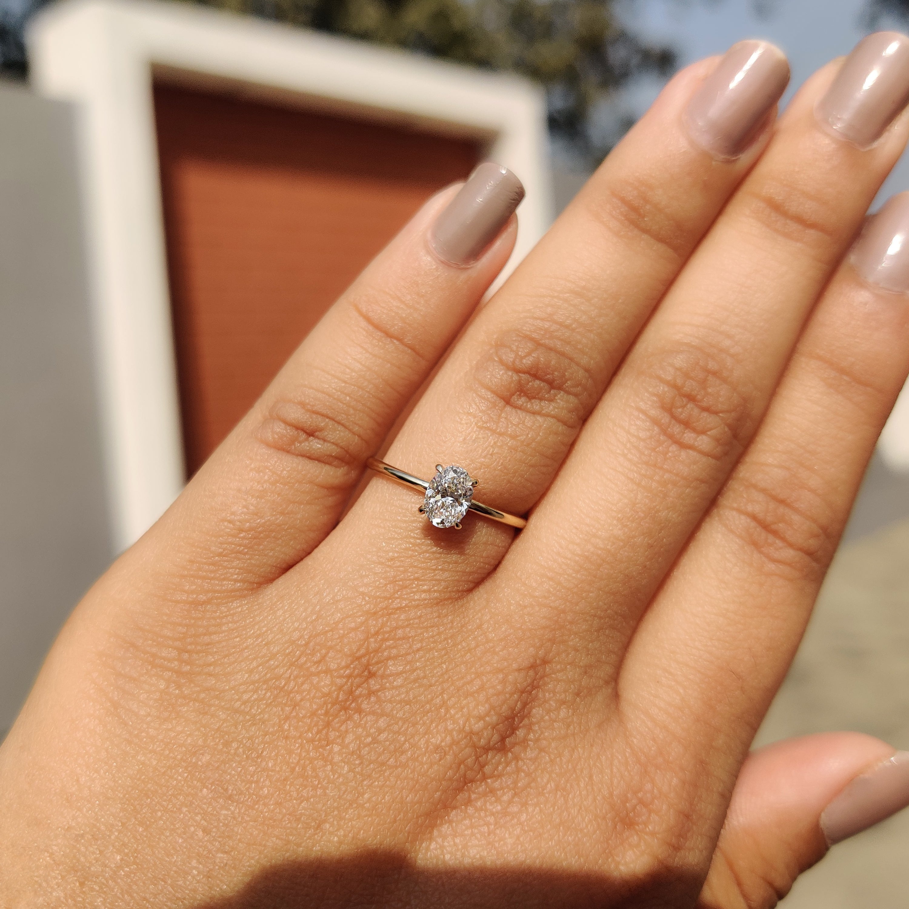 Oval Shaped Diamond Engagement Ring in Solitaire Setting