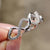 Twisted wedding band in white gold, designed for a modern and stylish look.