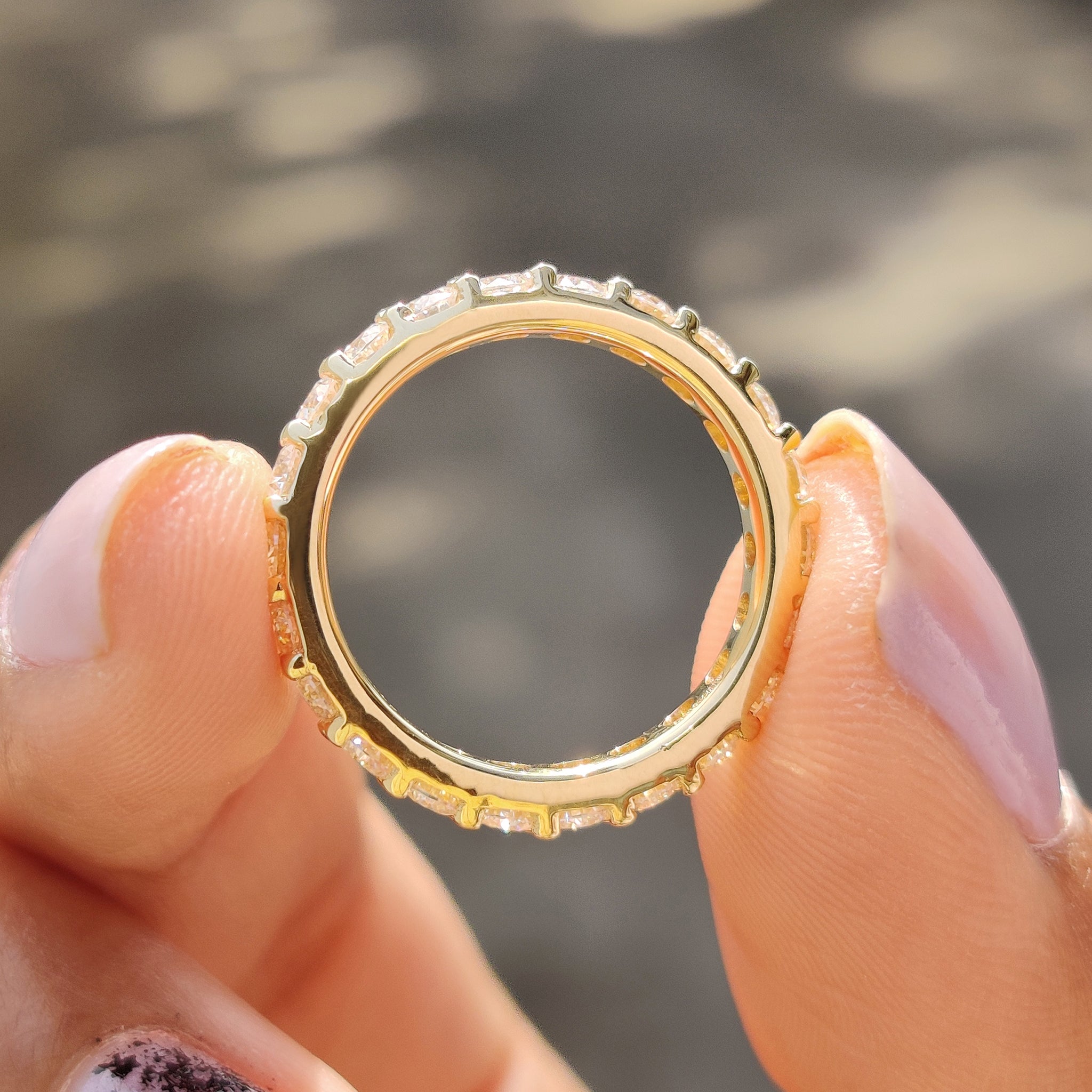 Round cut wedding band with custom moissanite band.