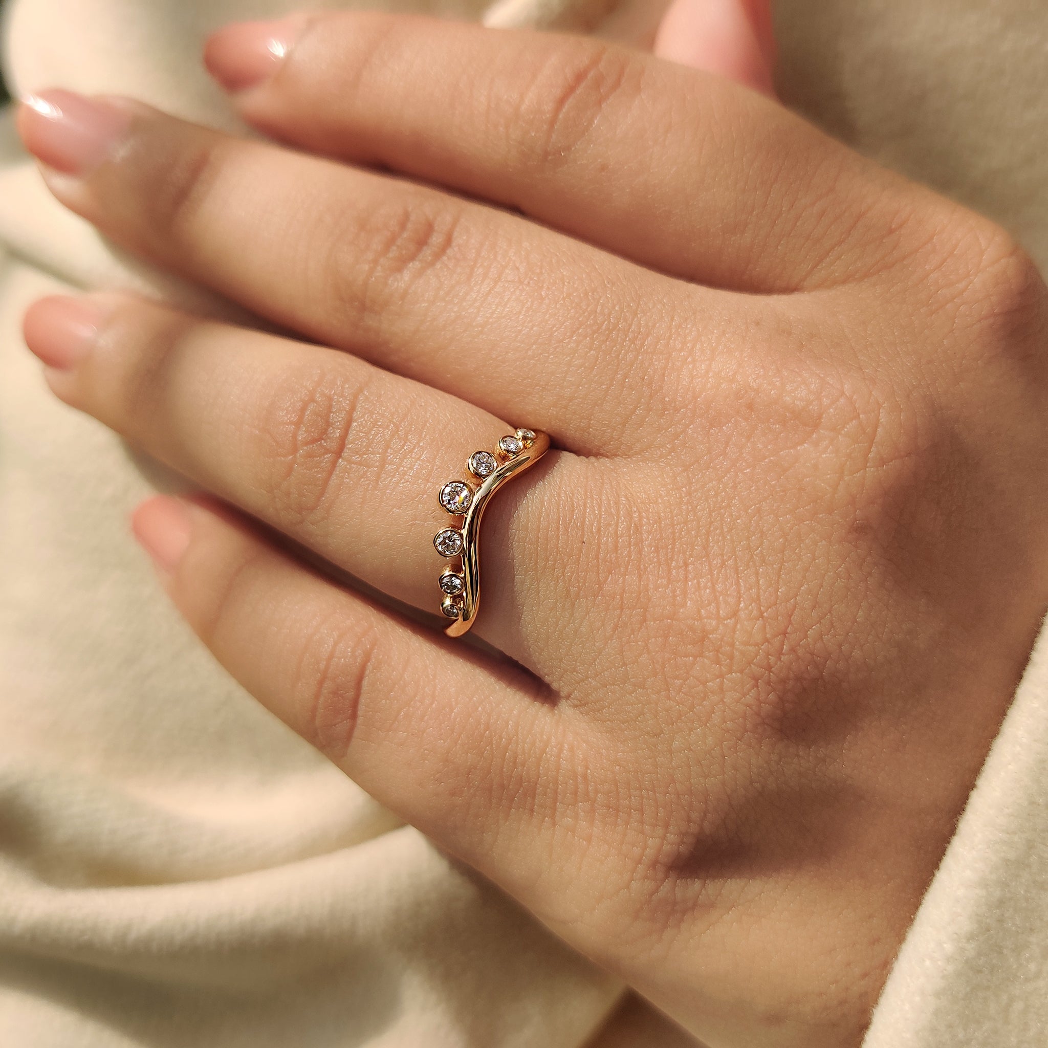 Half eternity yellow gold wedding band.