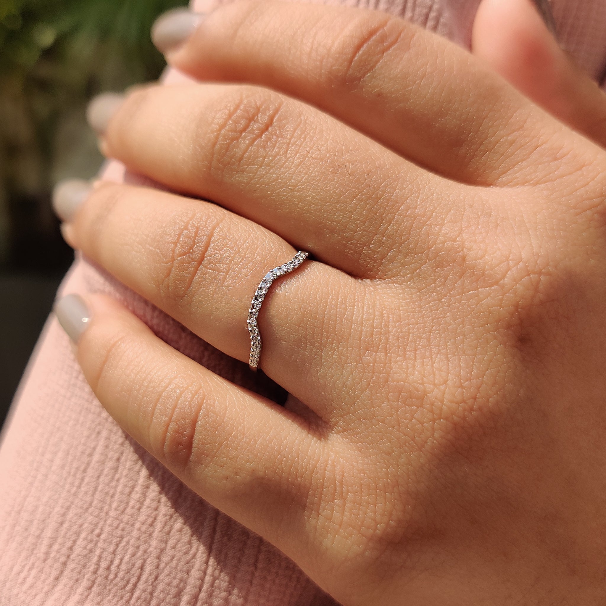 Simple wedding band crafted with lab grown diamonds.
