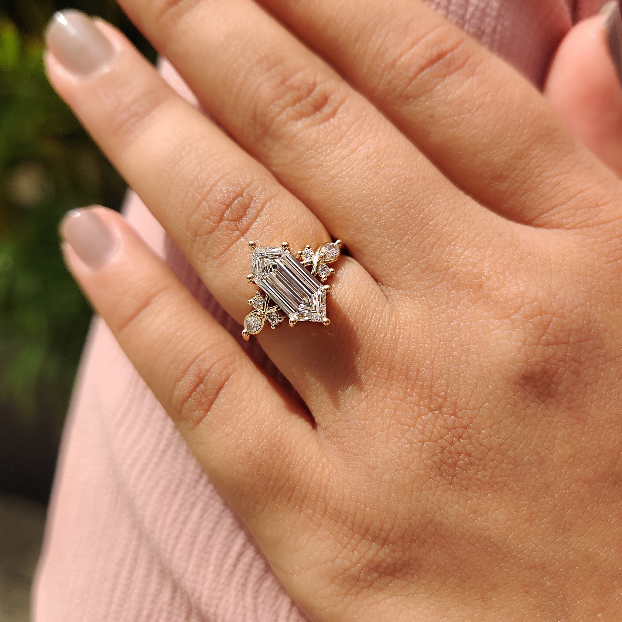 Cluster engagement ring with 6 prong setting.