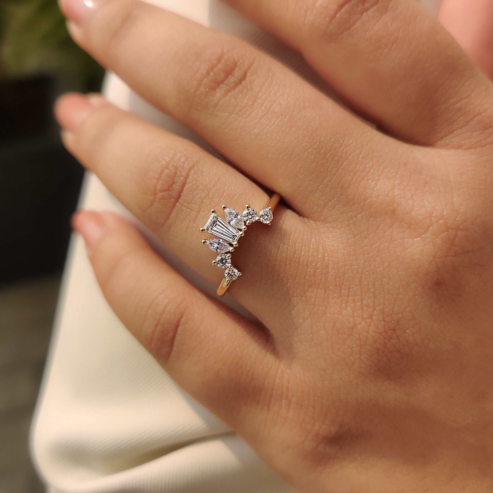 Marquise and round cut band in tiara wedding band form.
