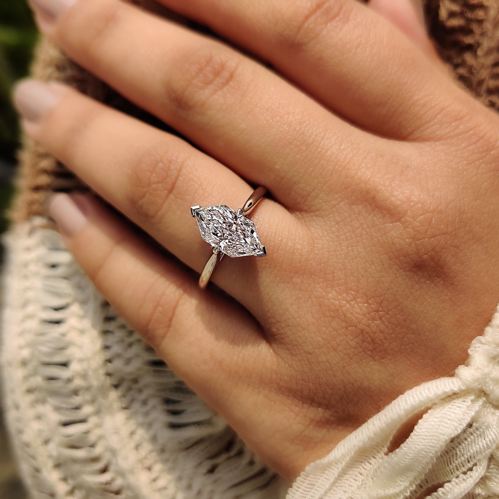 Solitaire engagement ring with V prong.
