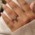Twisted shank ring with a heart prong setting and Lab Grown Diamond.
