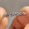 Lab Grown Diamond set in a half eternity wedding band.

