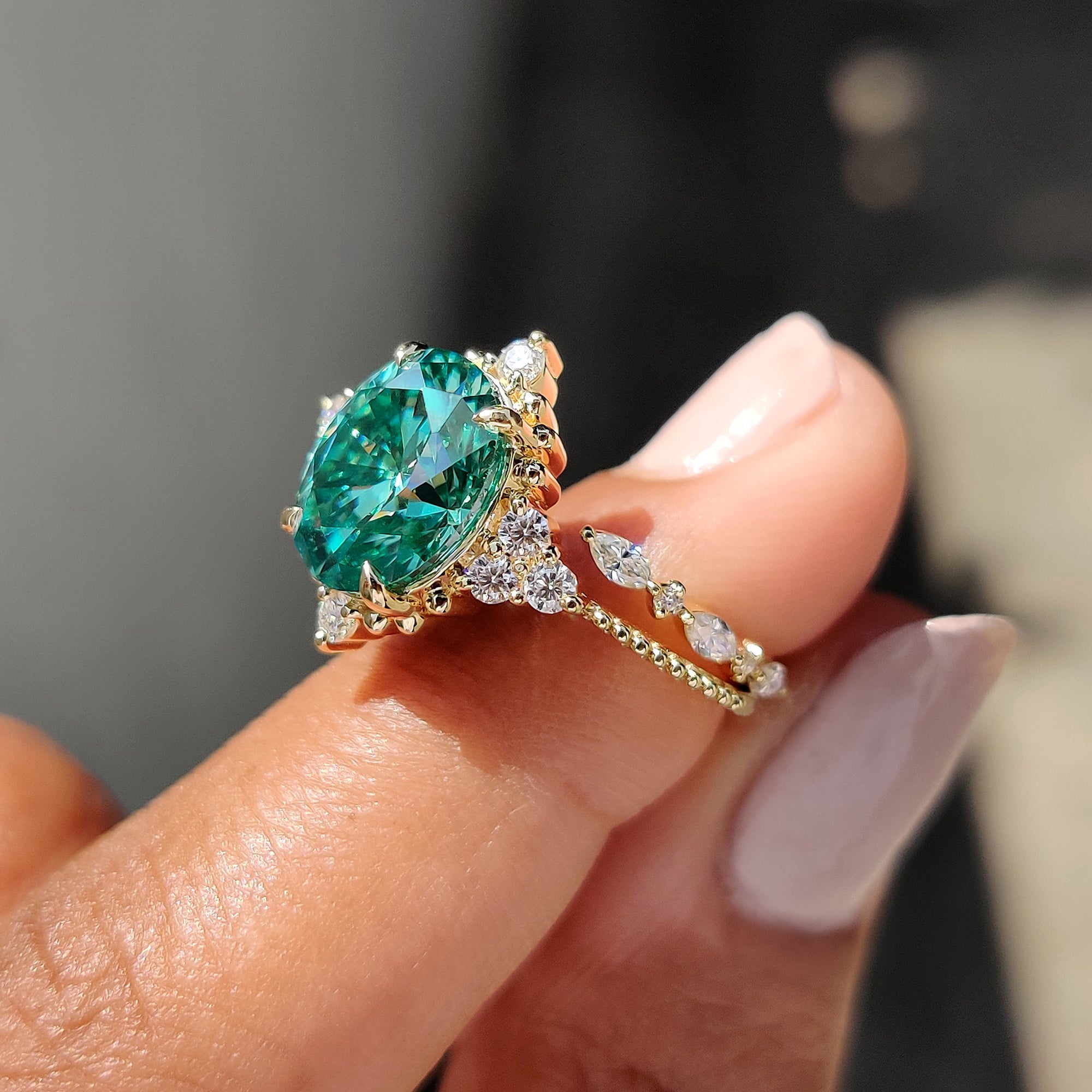 Moissanite bridal set featuring a unique ring and open gap wedding band.
