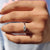 Marquise cut engagement ring with white gold ring