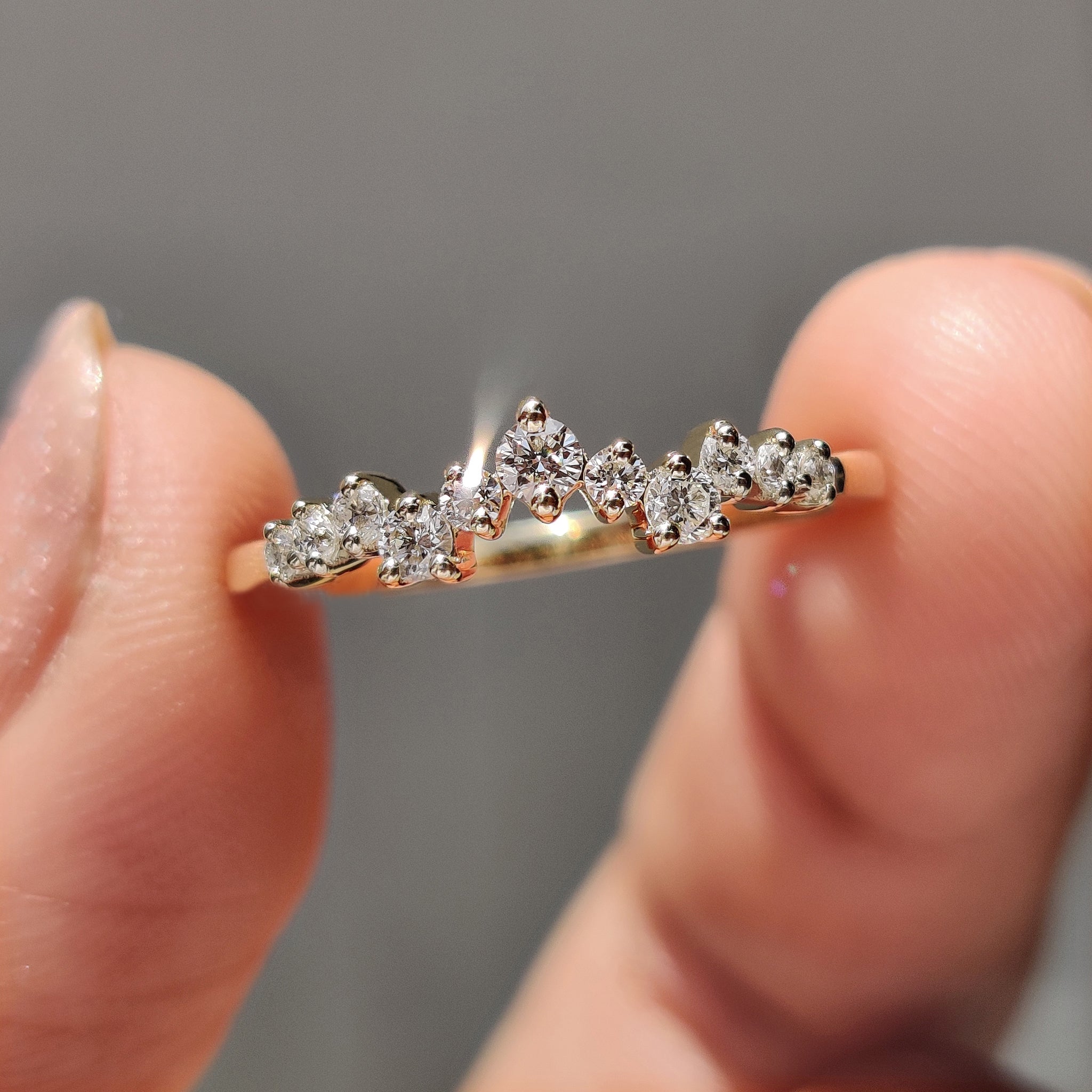 Yellow gold wedding band paired beautifully with a round diamond band.
