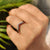 Curved wedding band in white gold with a sleek design.