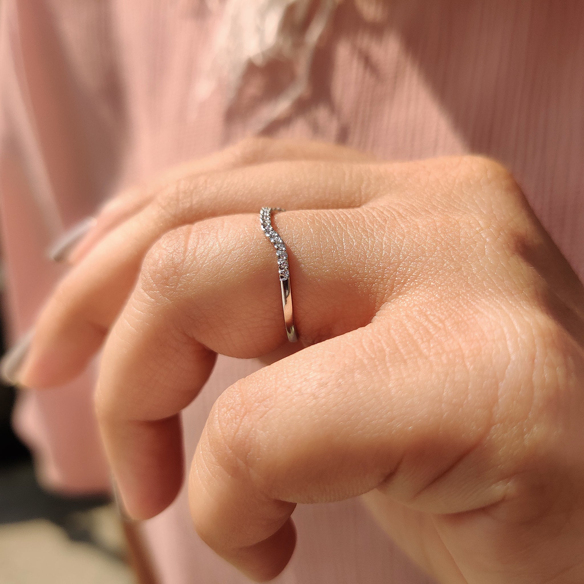 White gold wedding band with a smooth, polished look.
