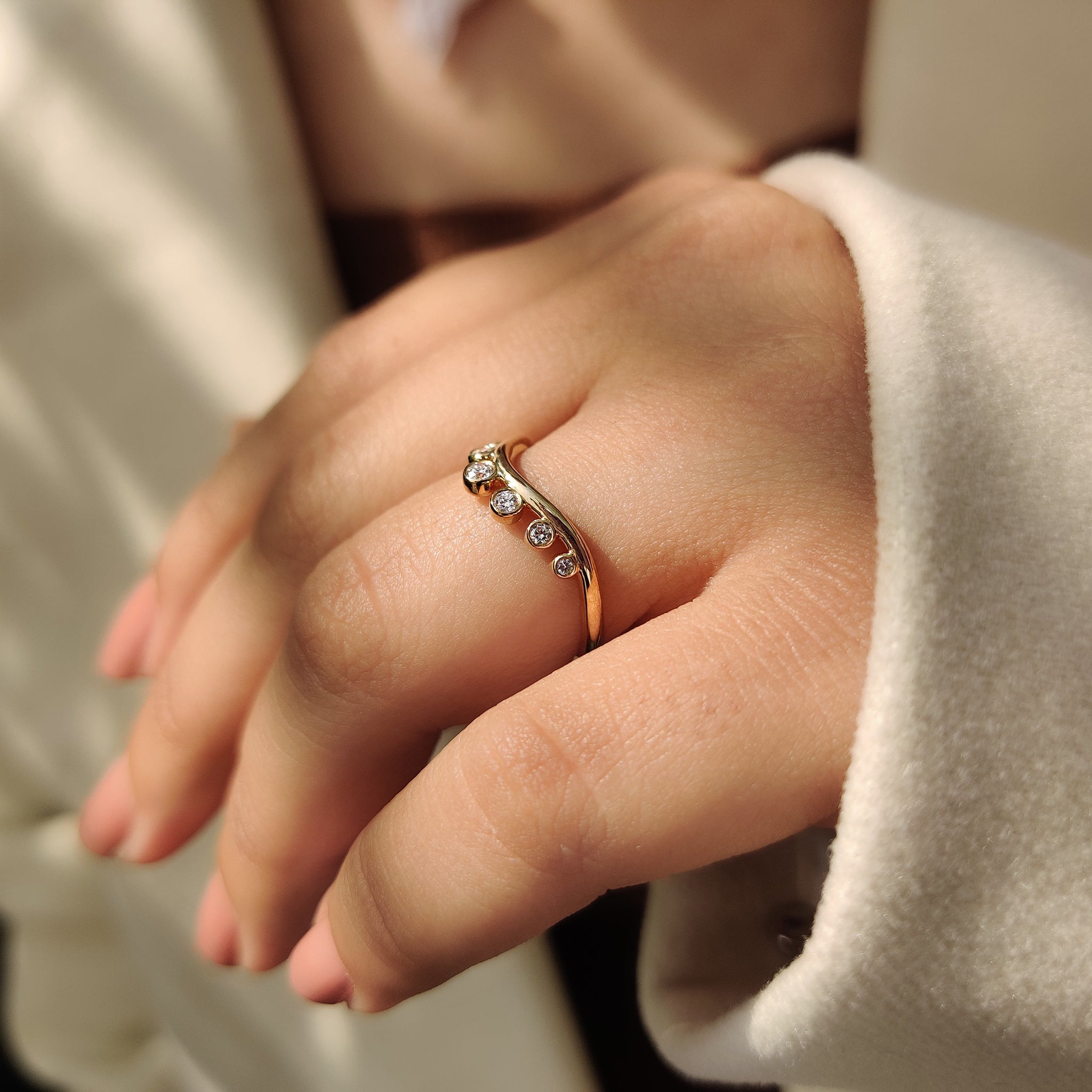 Bezel set diamond wedding band.