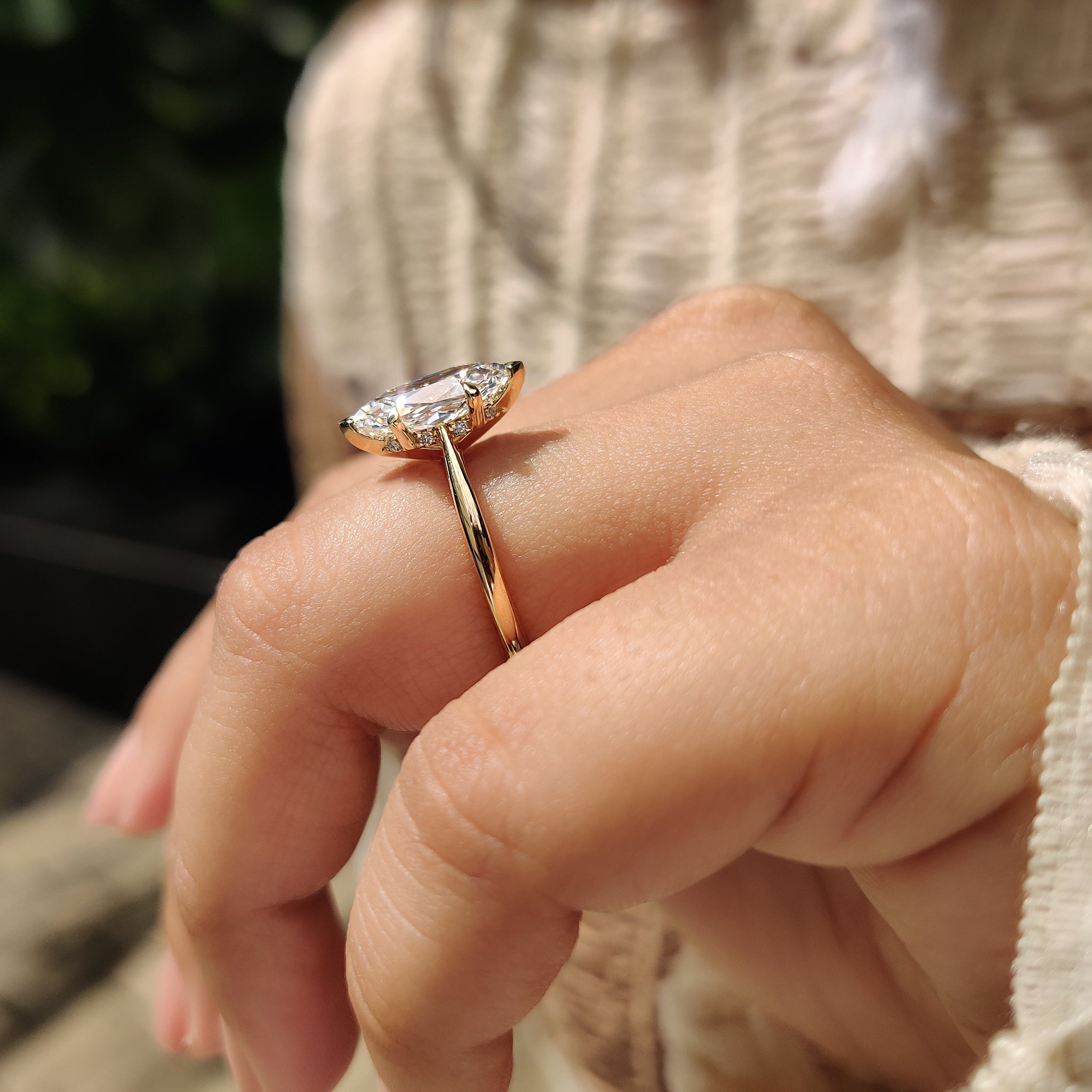 Tapered shank ring with cathedral set engagement ring.