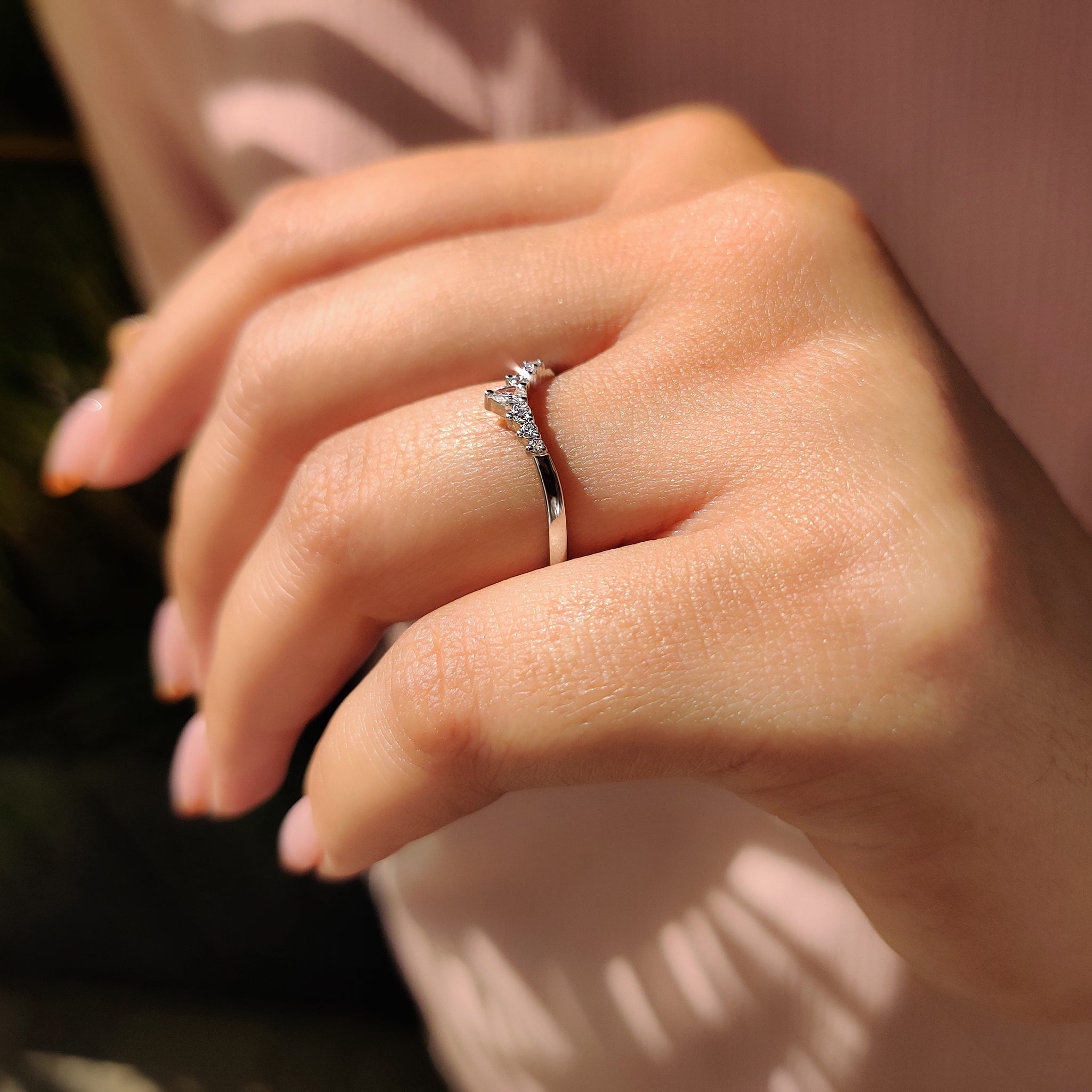 Lab Grown Diamond set into a graceful curved band.
