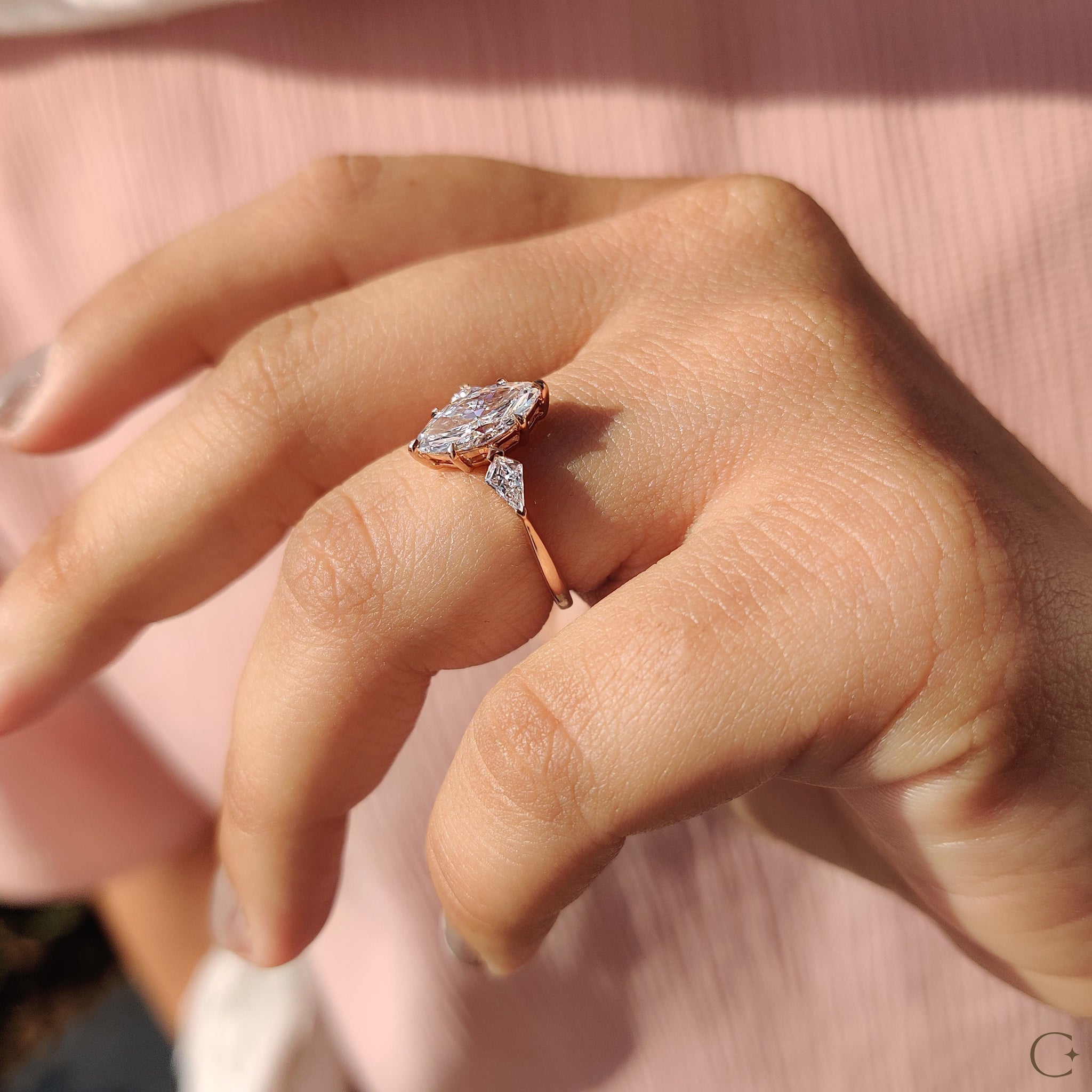 Rose gold engagement ring with a modern touch.
