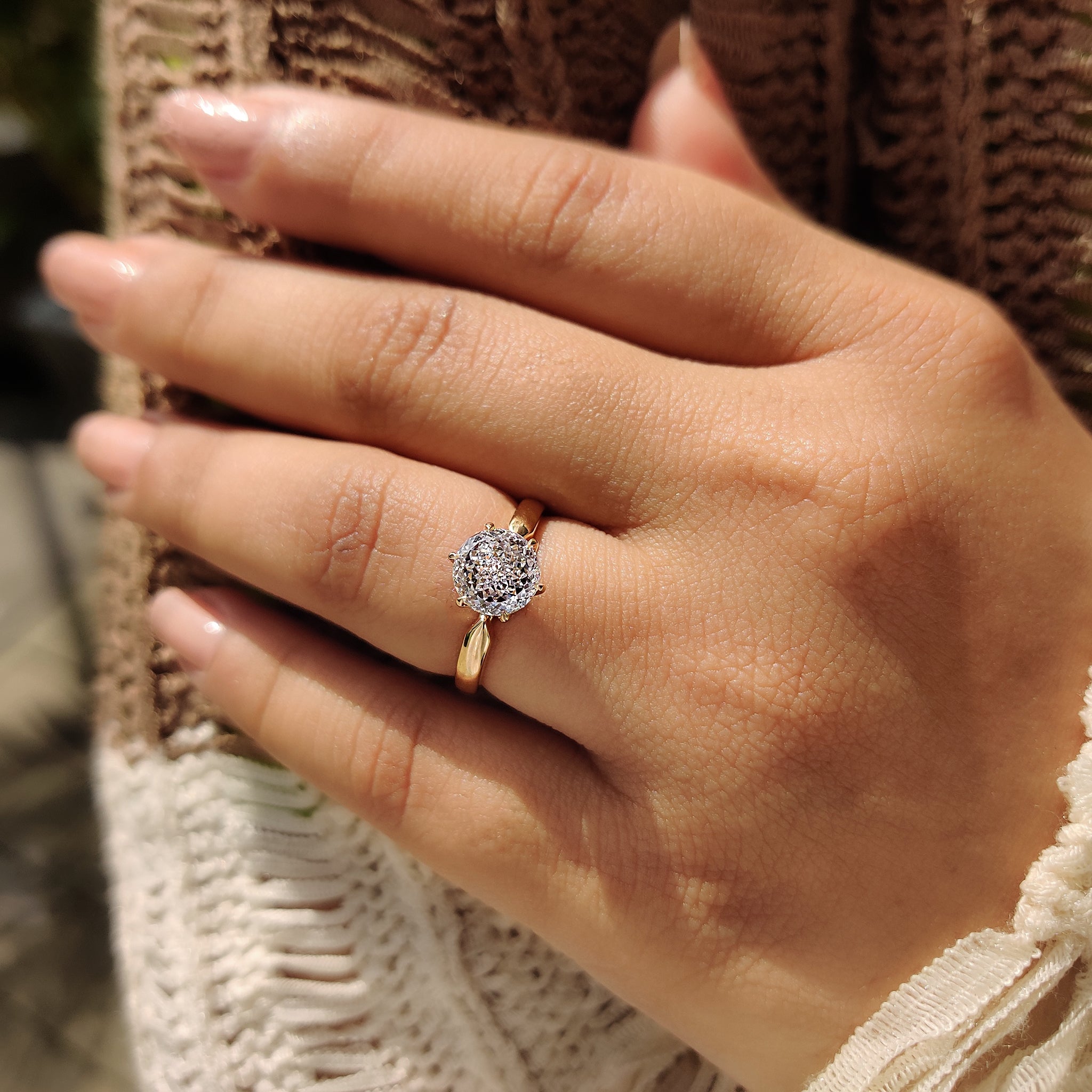 Handmade jewelry with solitaire diamond ring.
