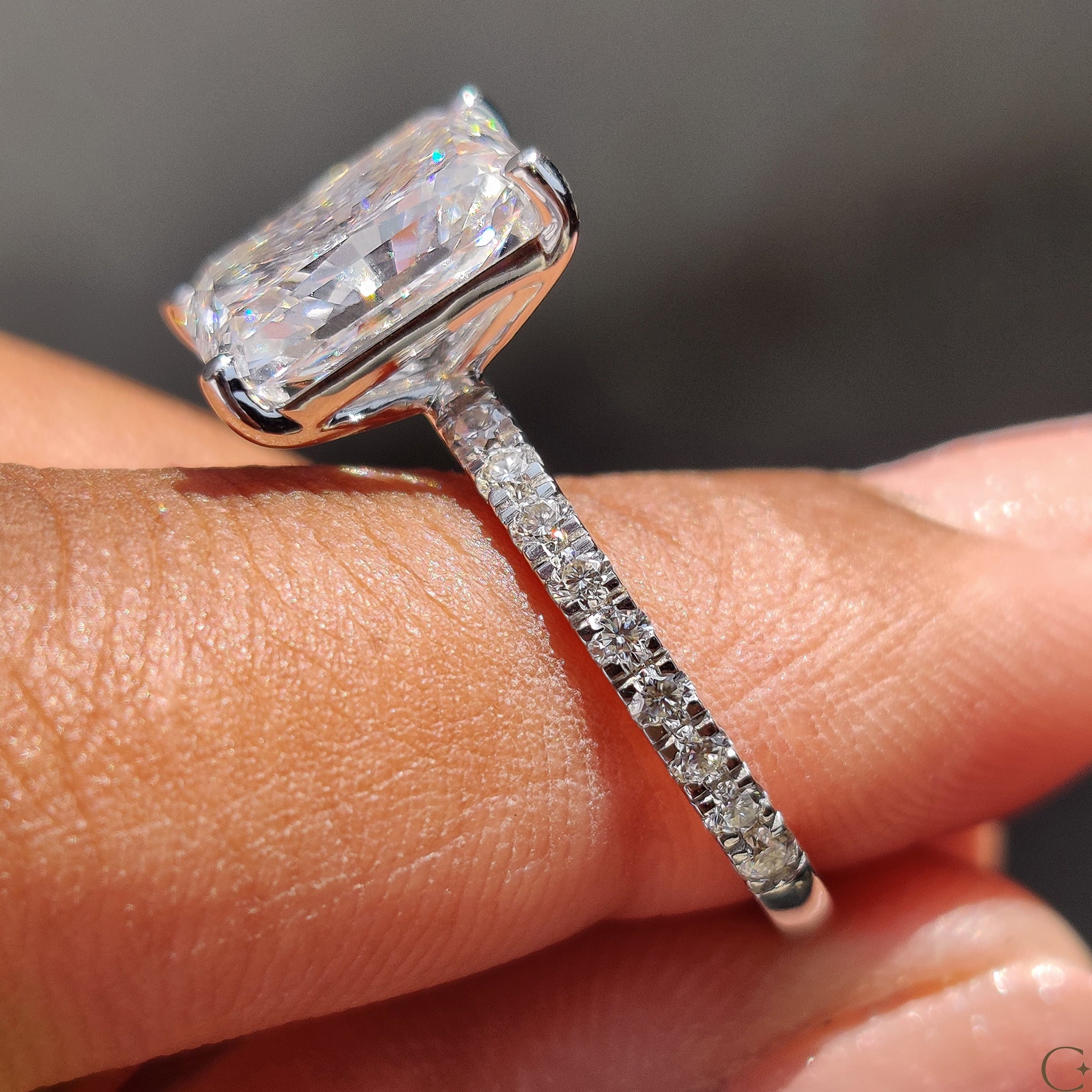 Exquisite handmade jewelry featuring a radiant cut diamond.
