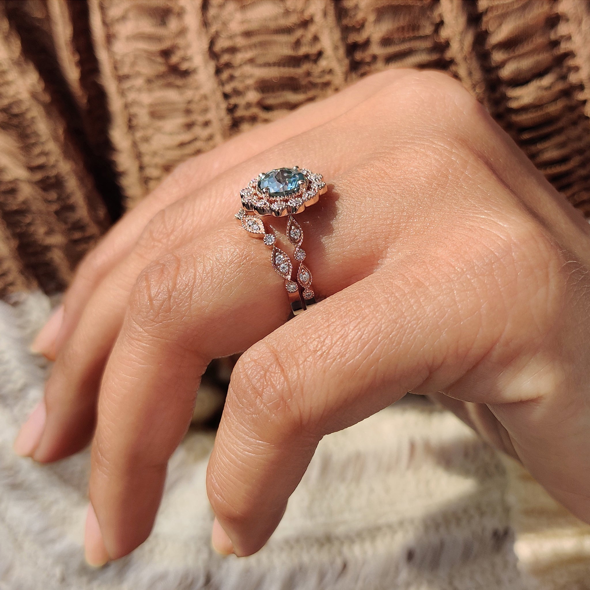 Round cut engagement ring with a vintage look and cathedral setting.
