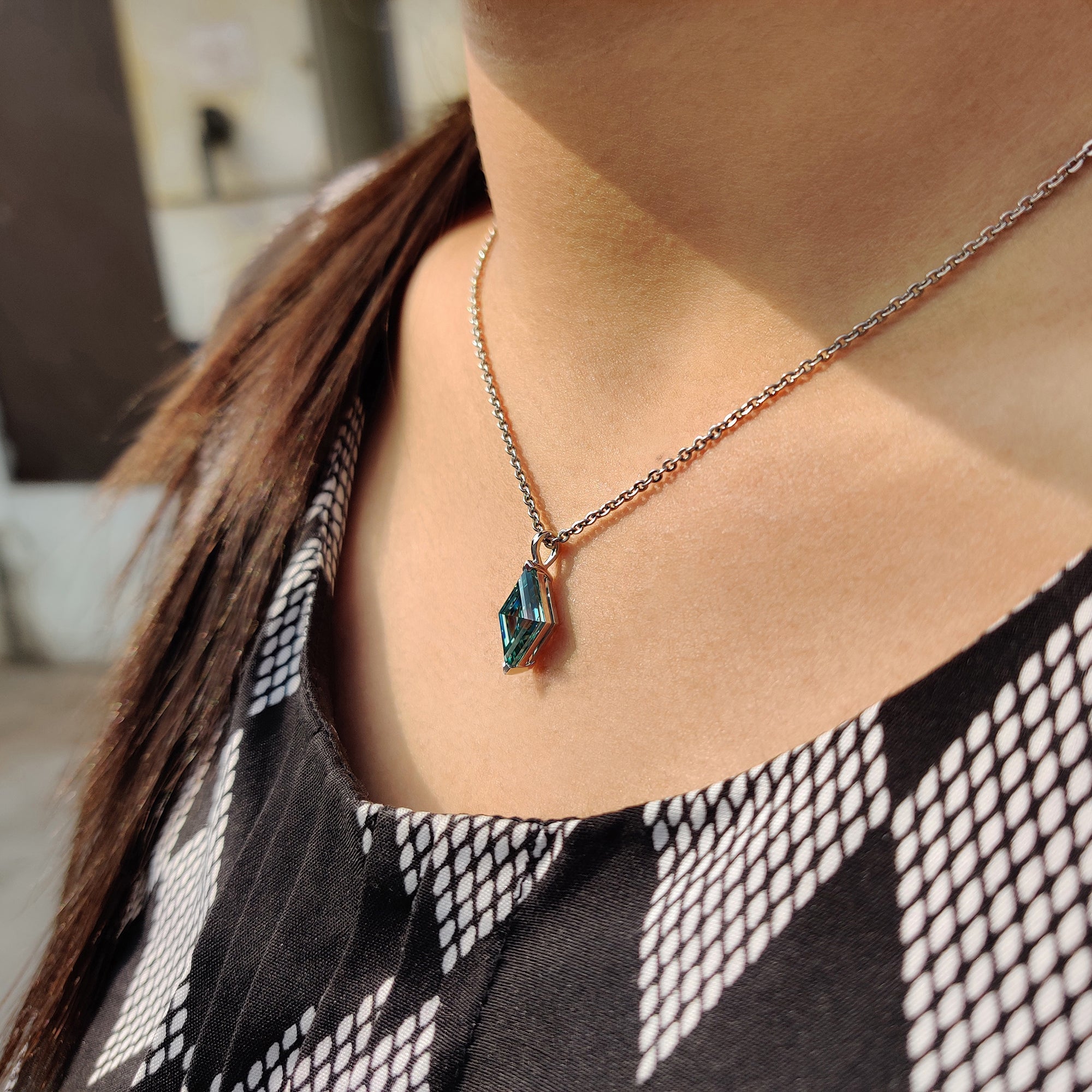 Bezel set pendant offered in lozenge cut pendant and solitaire pendant formats.
