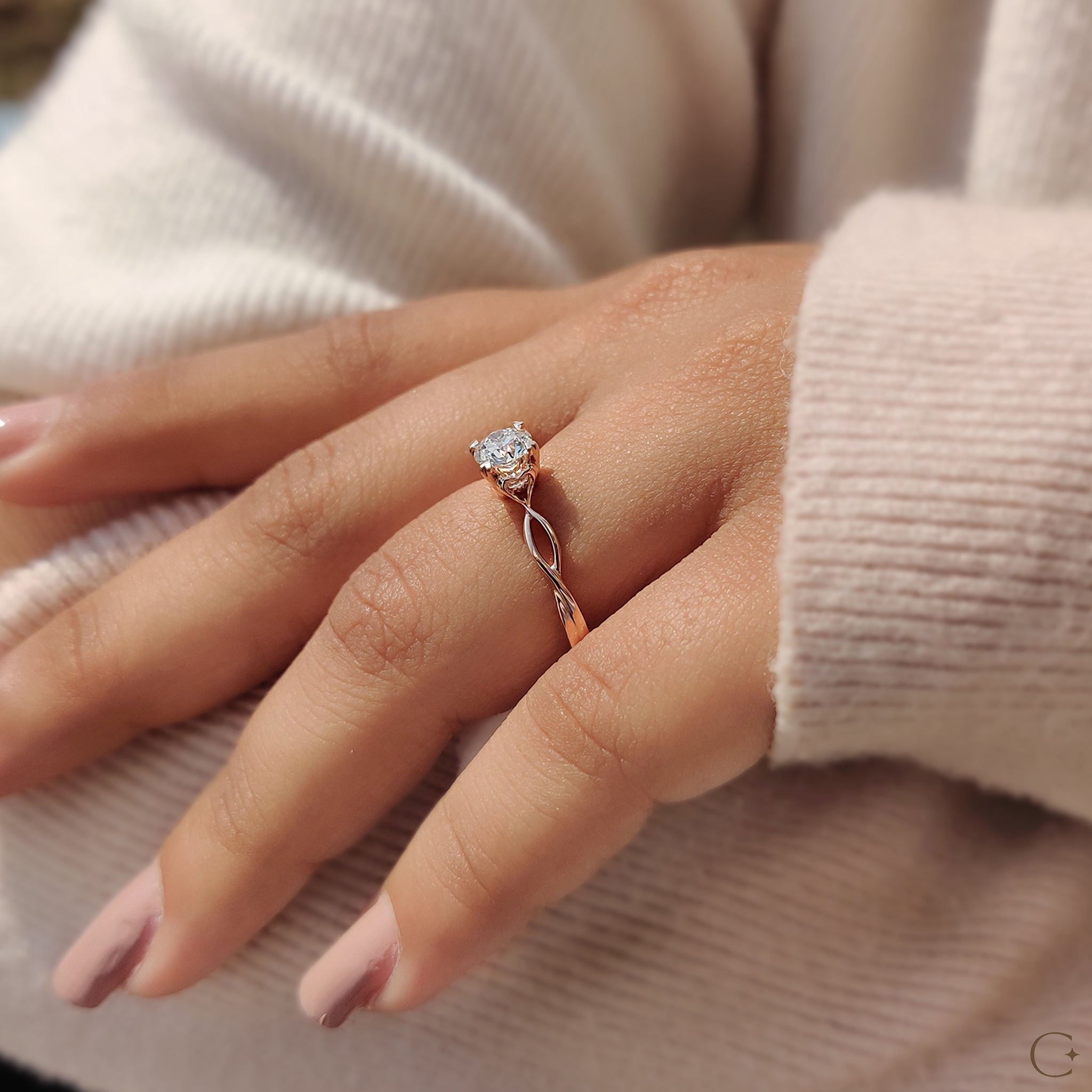 Buy engagement ring in rose gold with a heart prong setting and round diamond.
