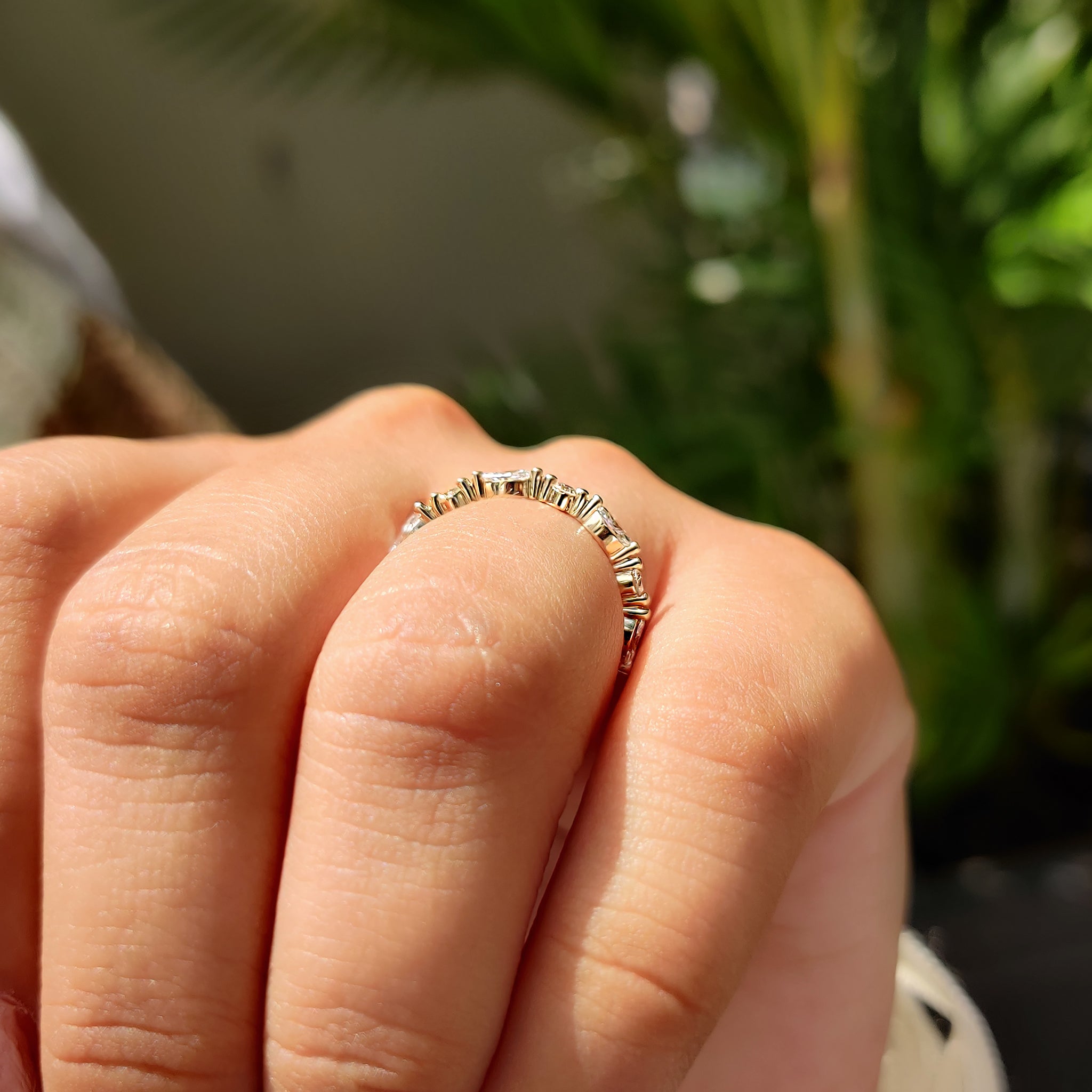 Handmade band in marquise and round wedding band.