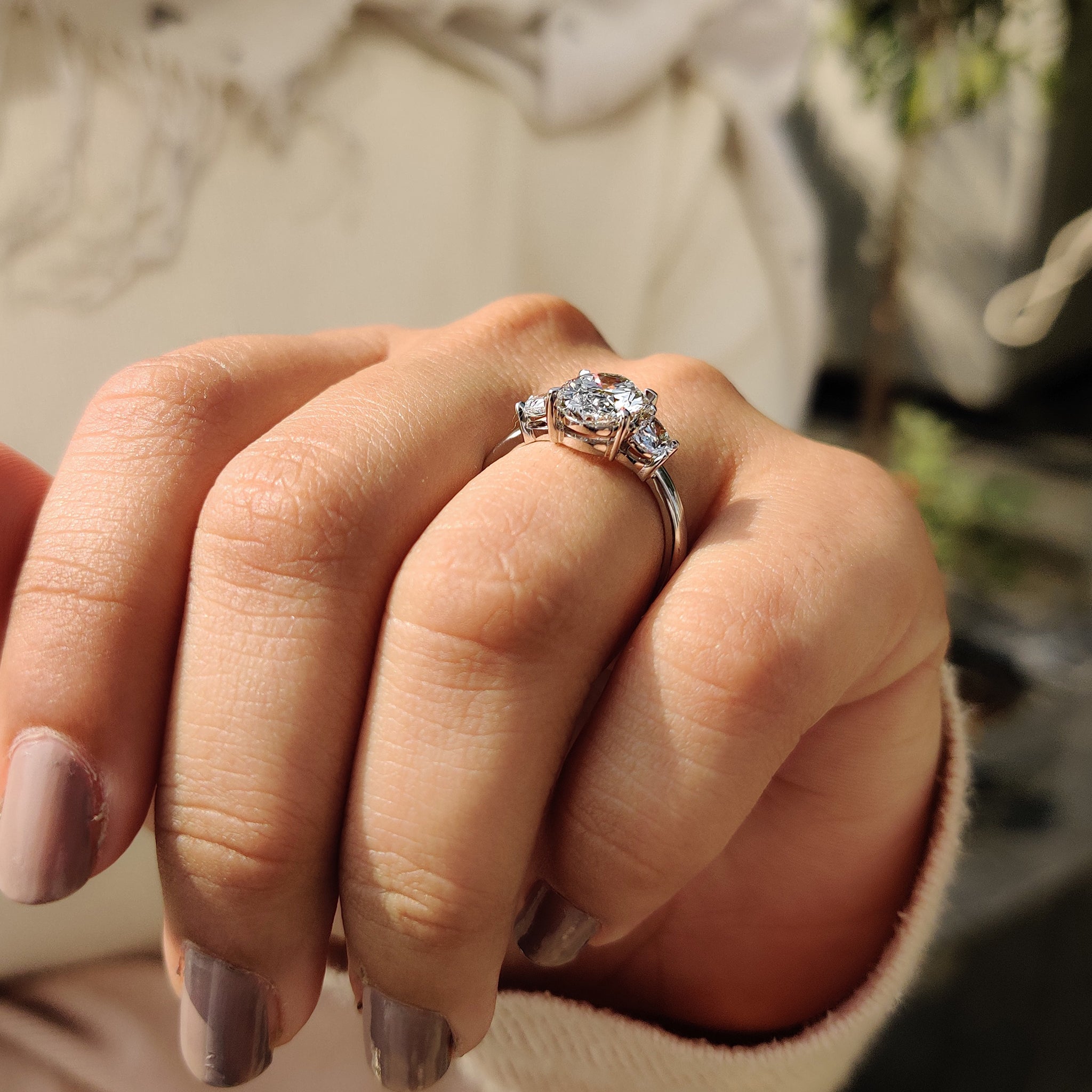 Oval Cut Diamond Engagement Ring With Half Moon Side Stone