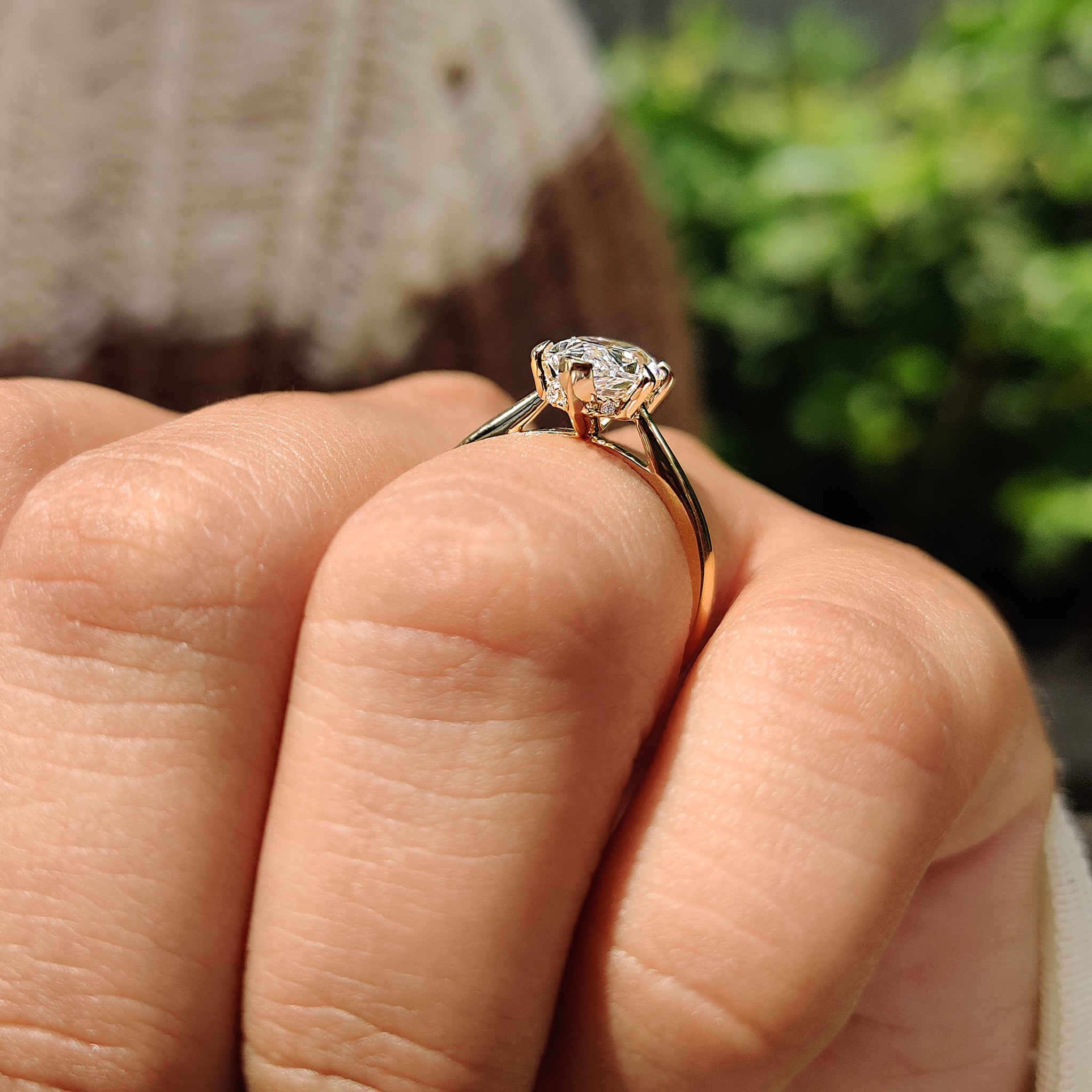 Solitaire engagement ring with v prong setting.