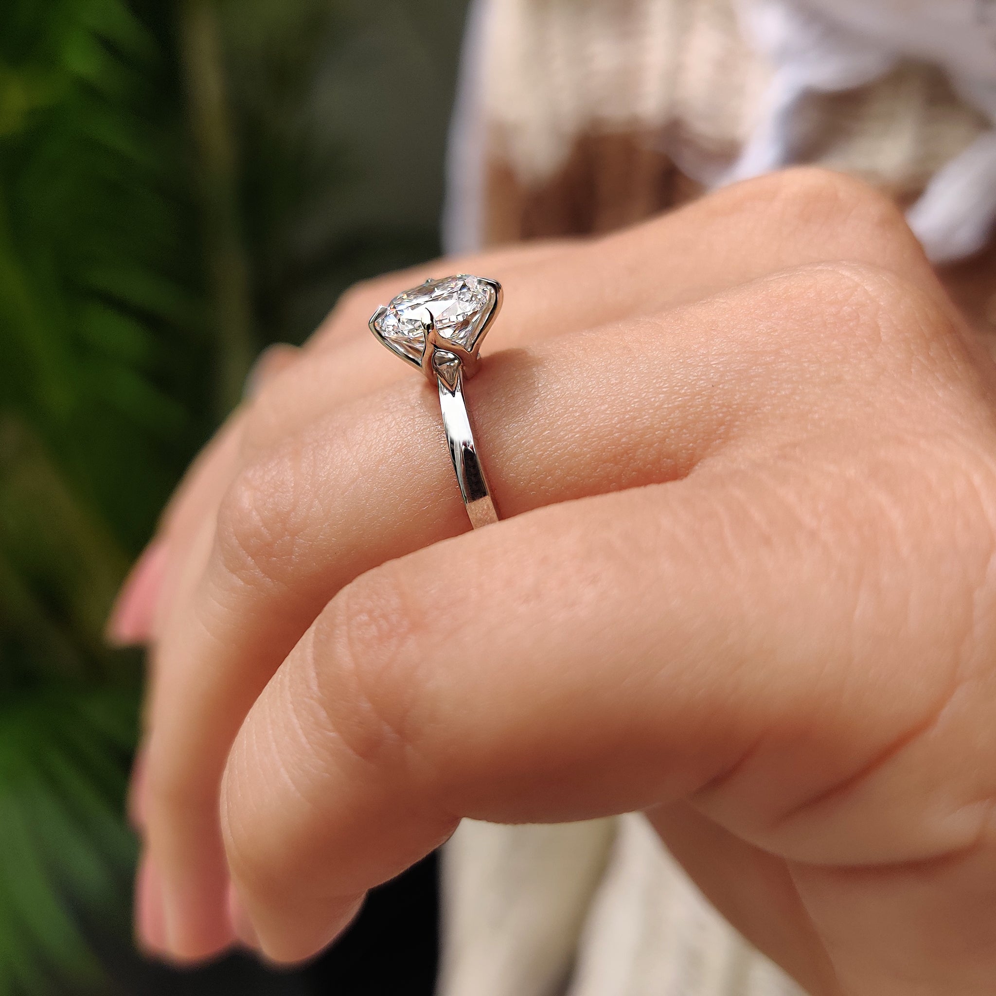 Carat diamonds ring in solitaire engagement style.
