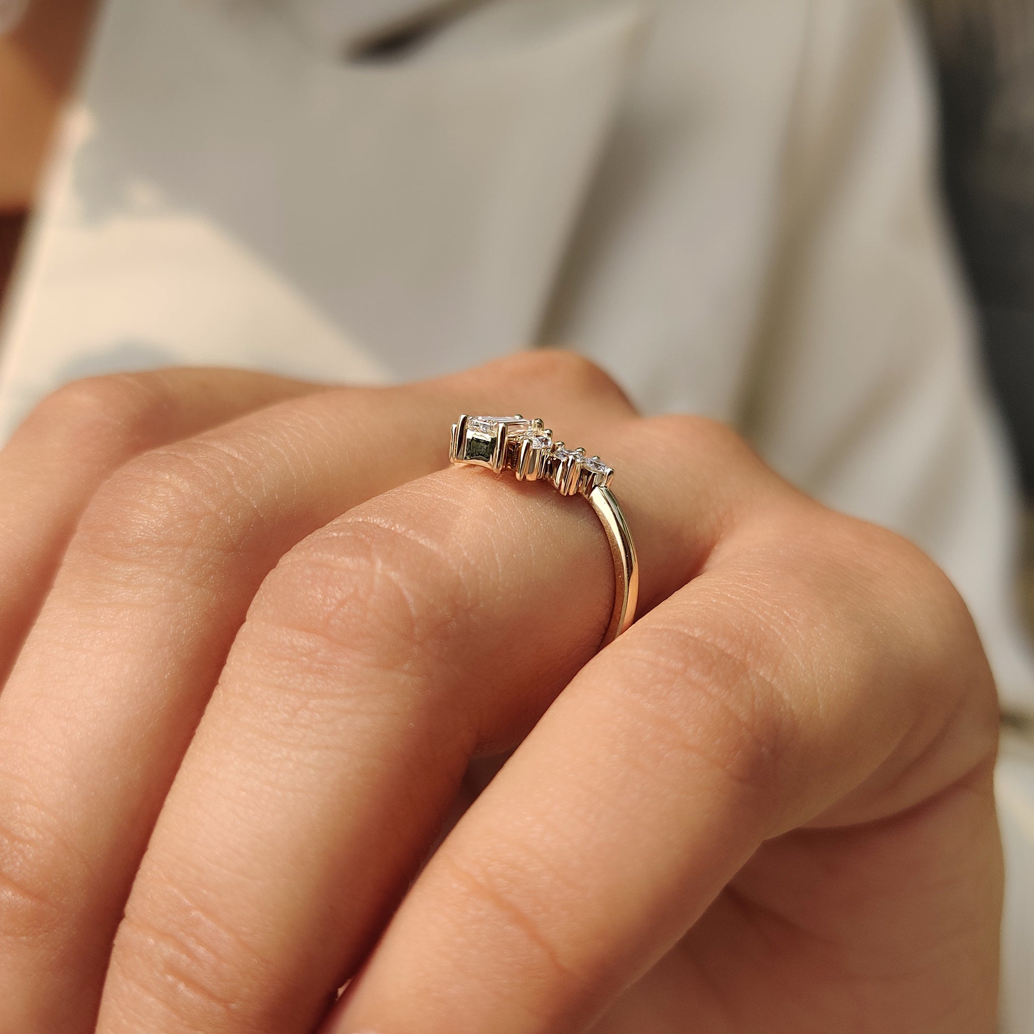 U shaped wedding band with marquise and round cut band.
