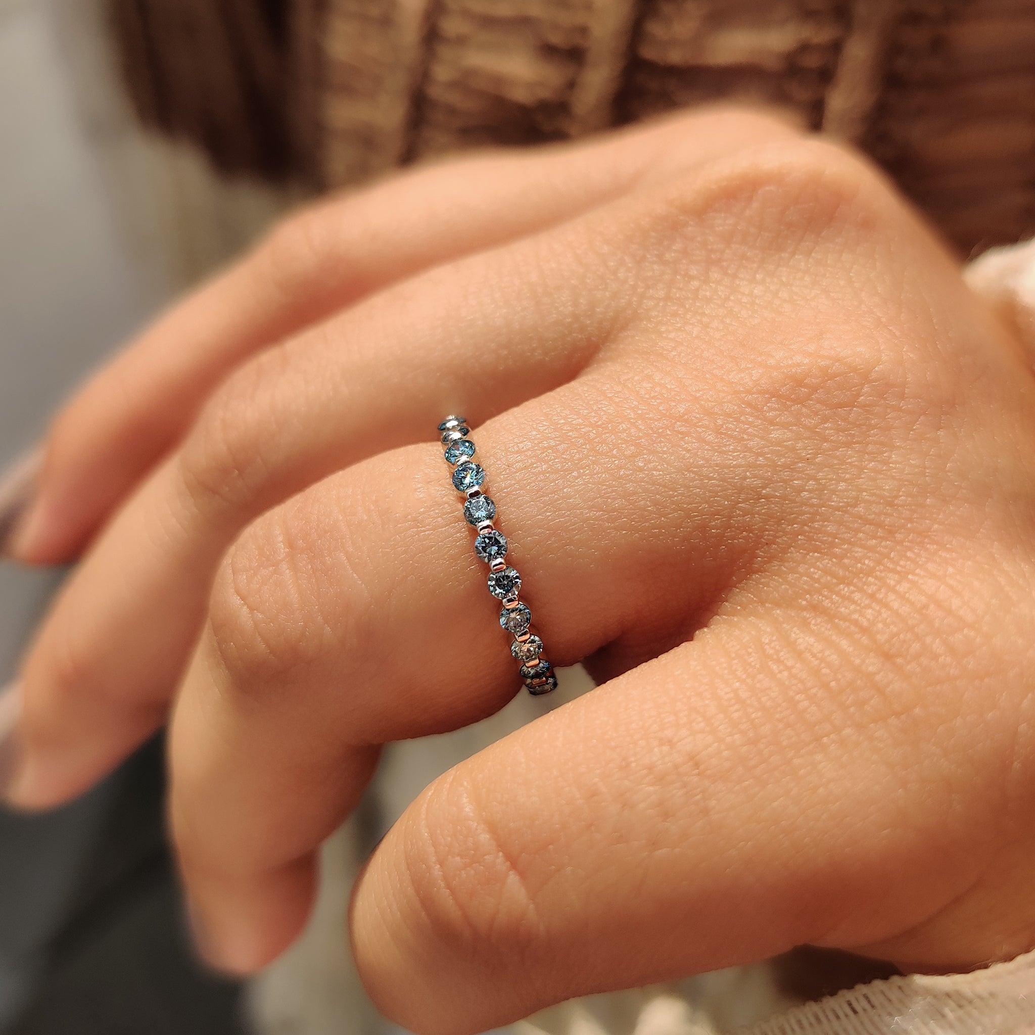 White gold diamond band with a smooth polished finish.
