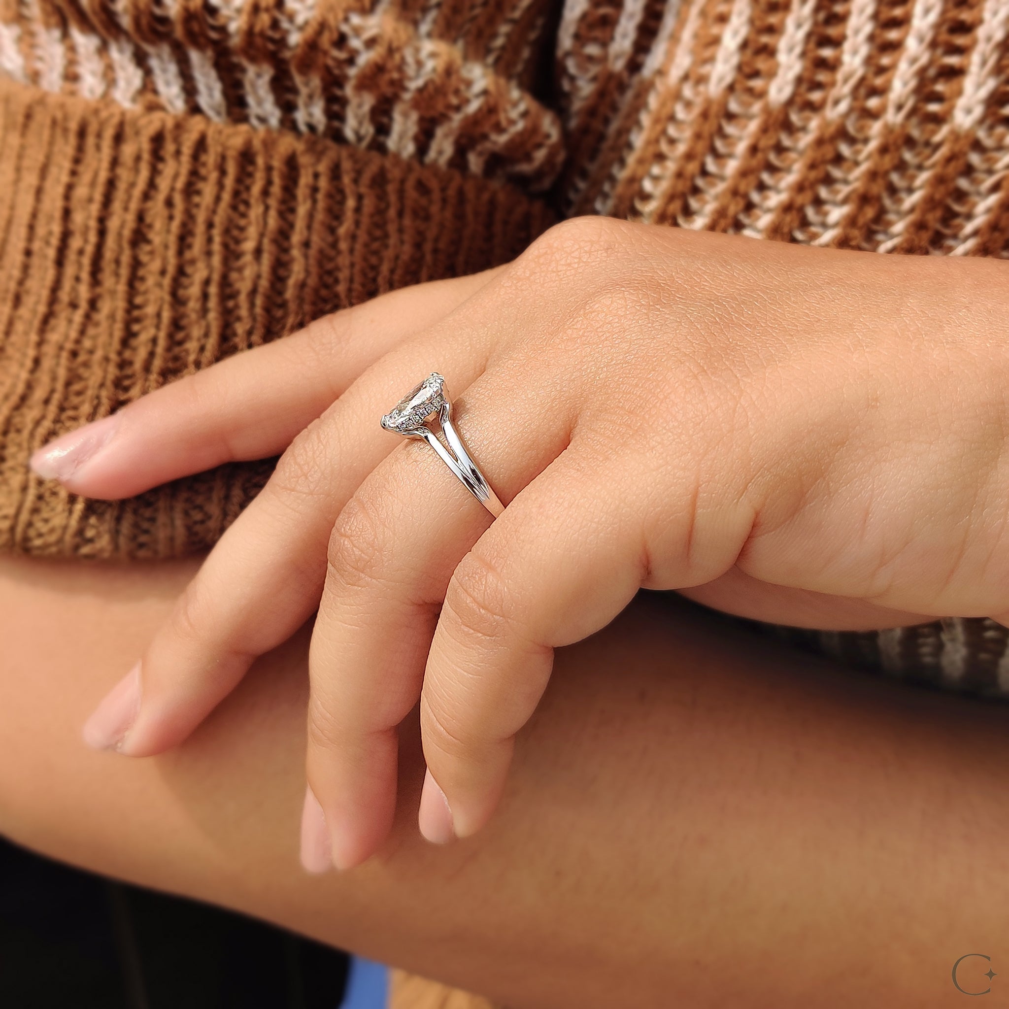 Split shank pear engagement ring featuring a sophisticated and modern style, ideal for special occasions.
