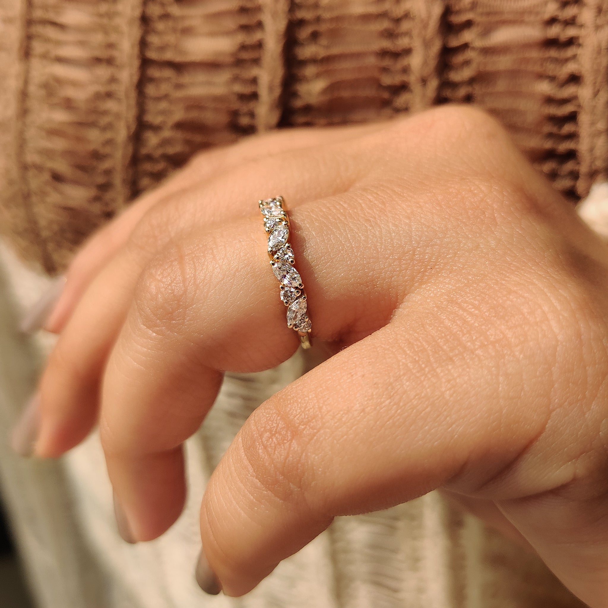 Half eternity diamond band in a sleek handmade design.
