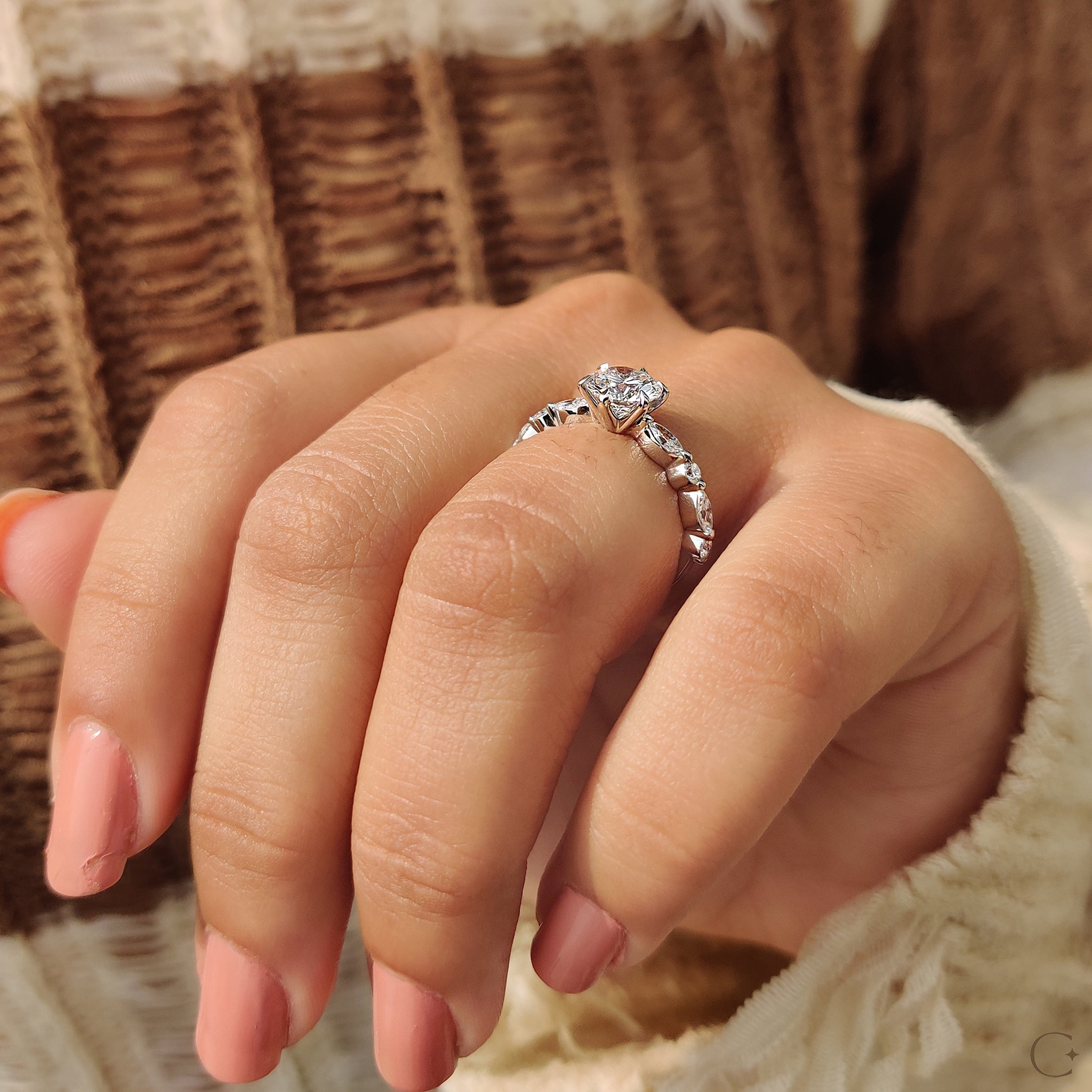 White gold engagement ring with a stunning center diamond.
