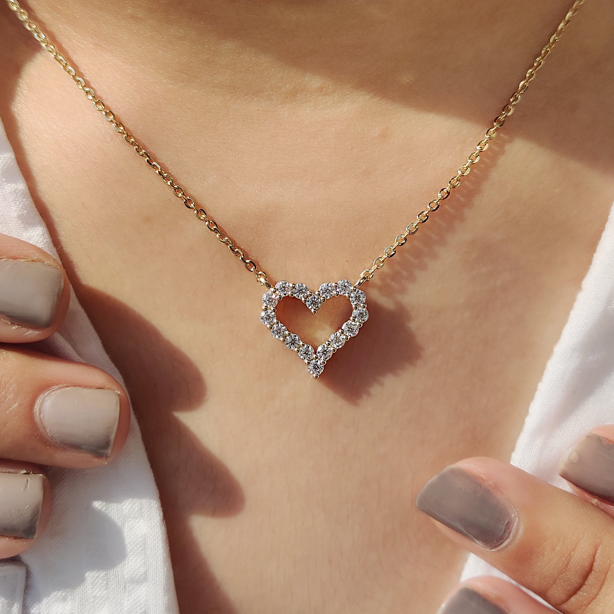 Lab Grown Diamond pendant with smooth gold setting.
