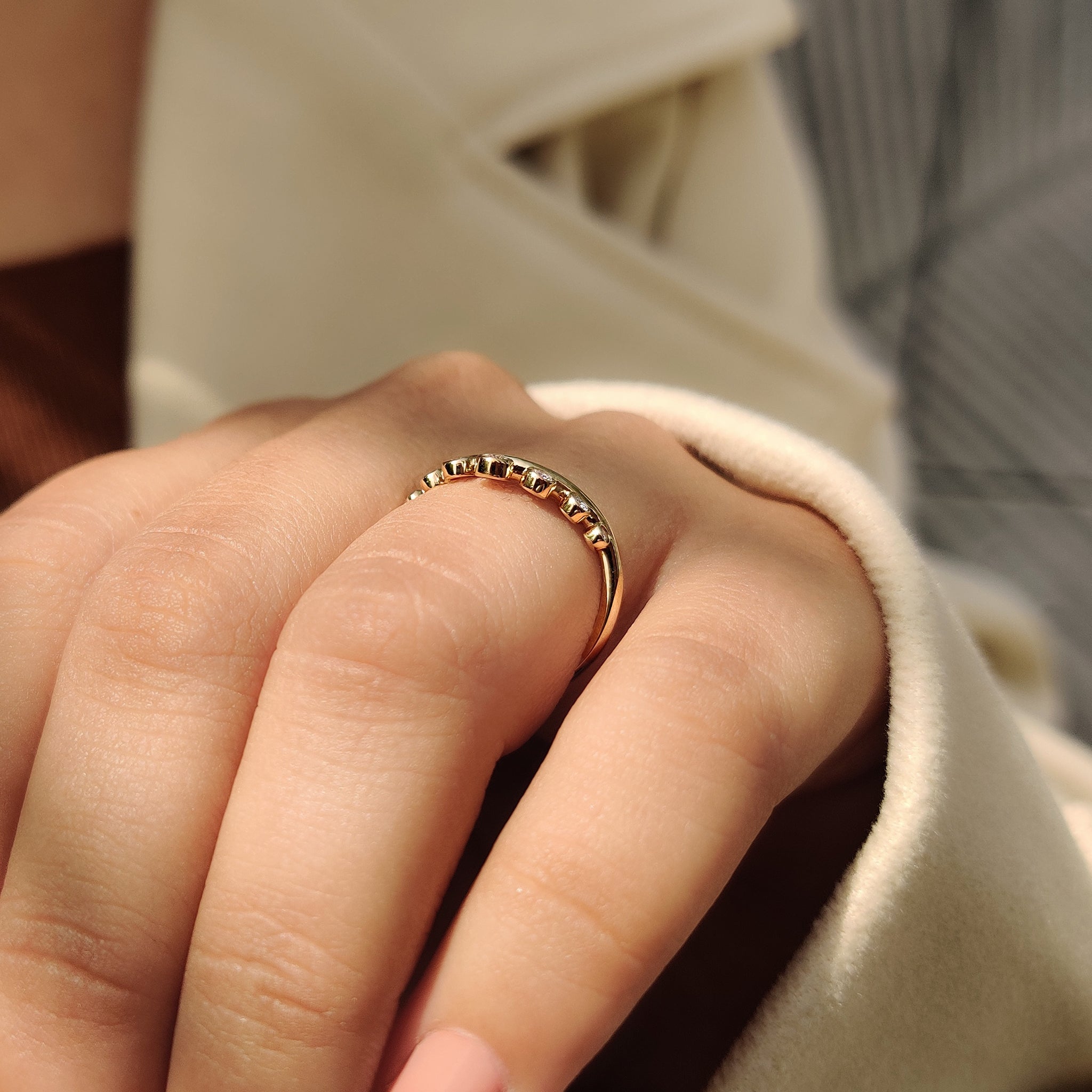 Stackable gold wedding band.