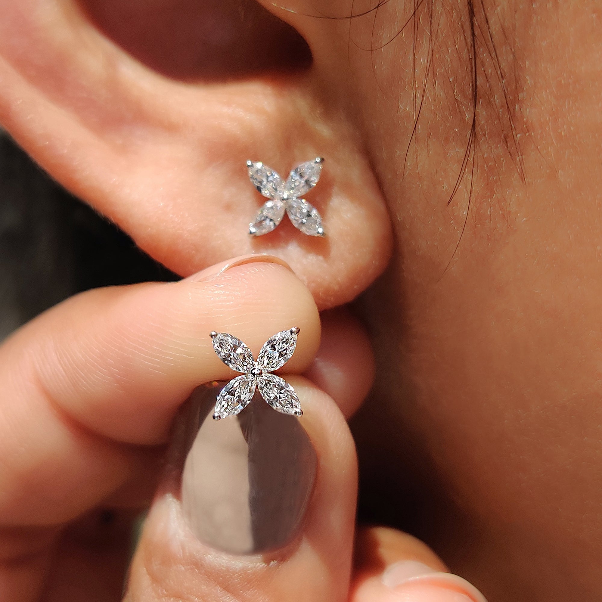 Marquise cut diamond earrings in white gold.