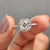 Cushion cut engagement ring with halo engagement ring.
