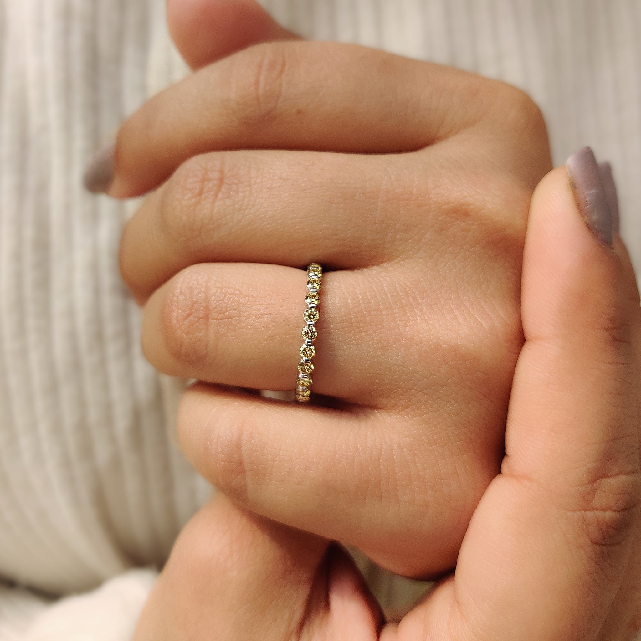 White gold band with brilliant lab grown diamonds.
