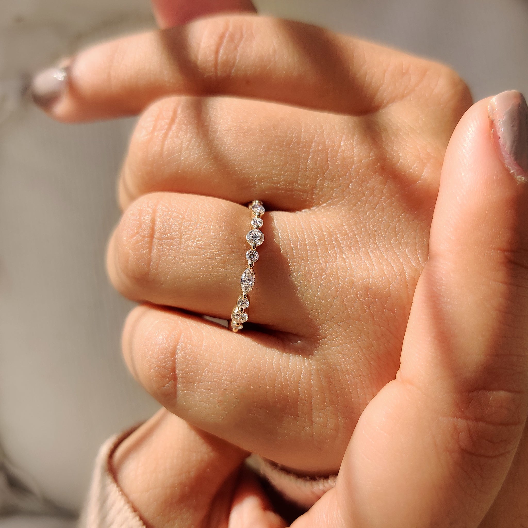 Diamond wedding band with marquise stones.
