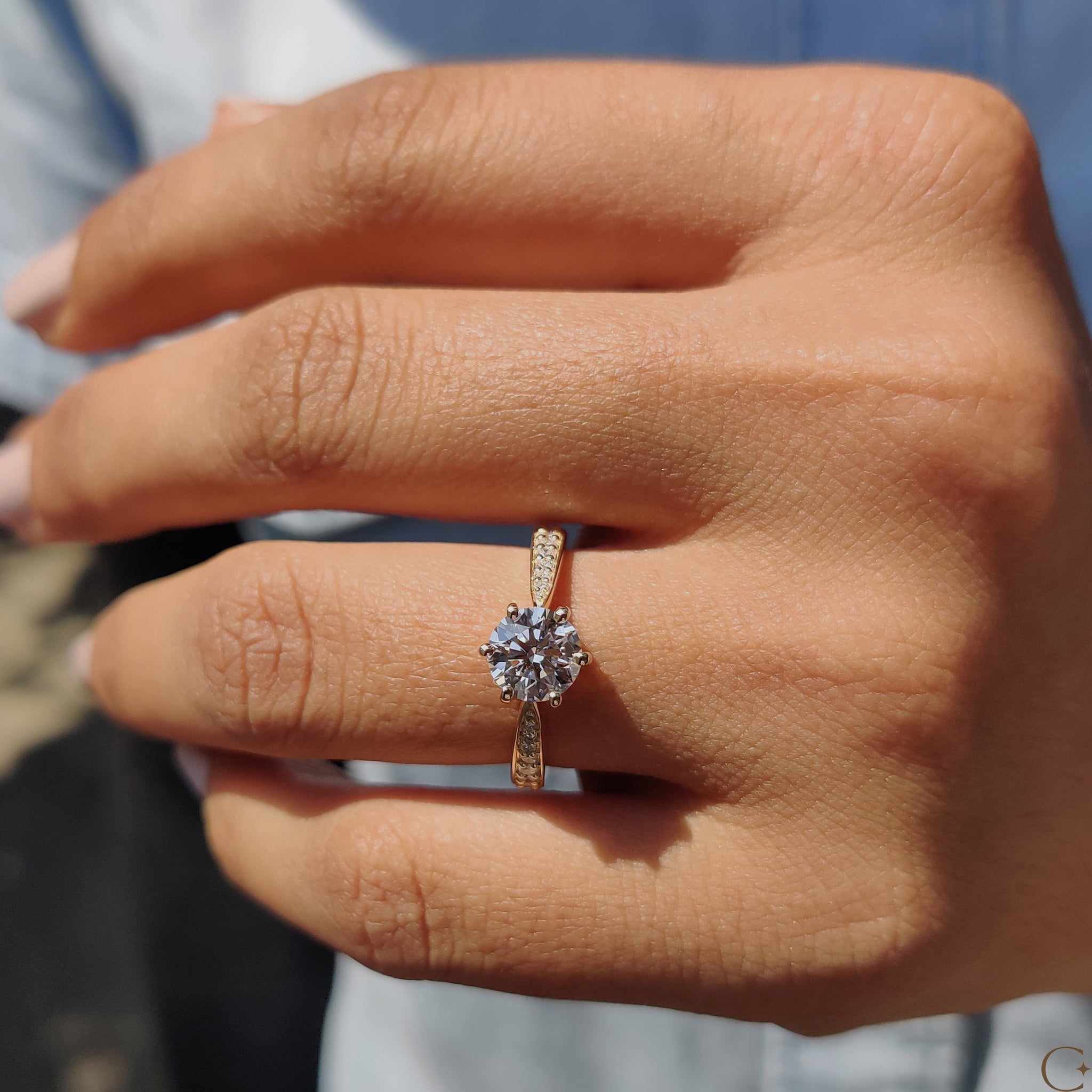 Classic yellow gold diamond ring with a radiant stone.

