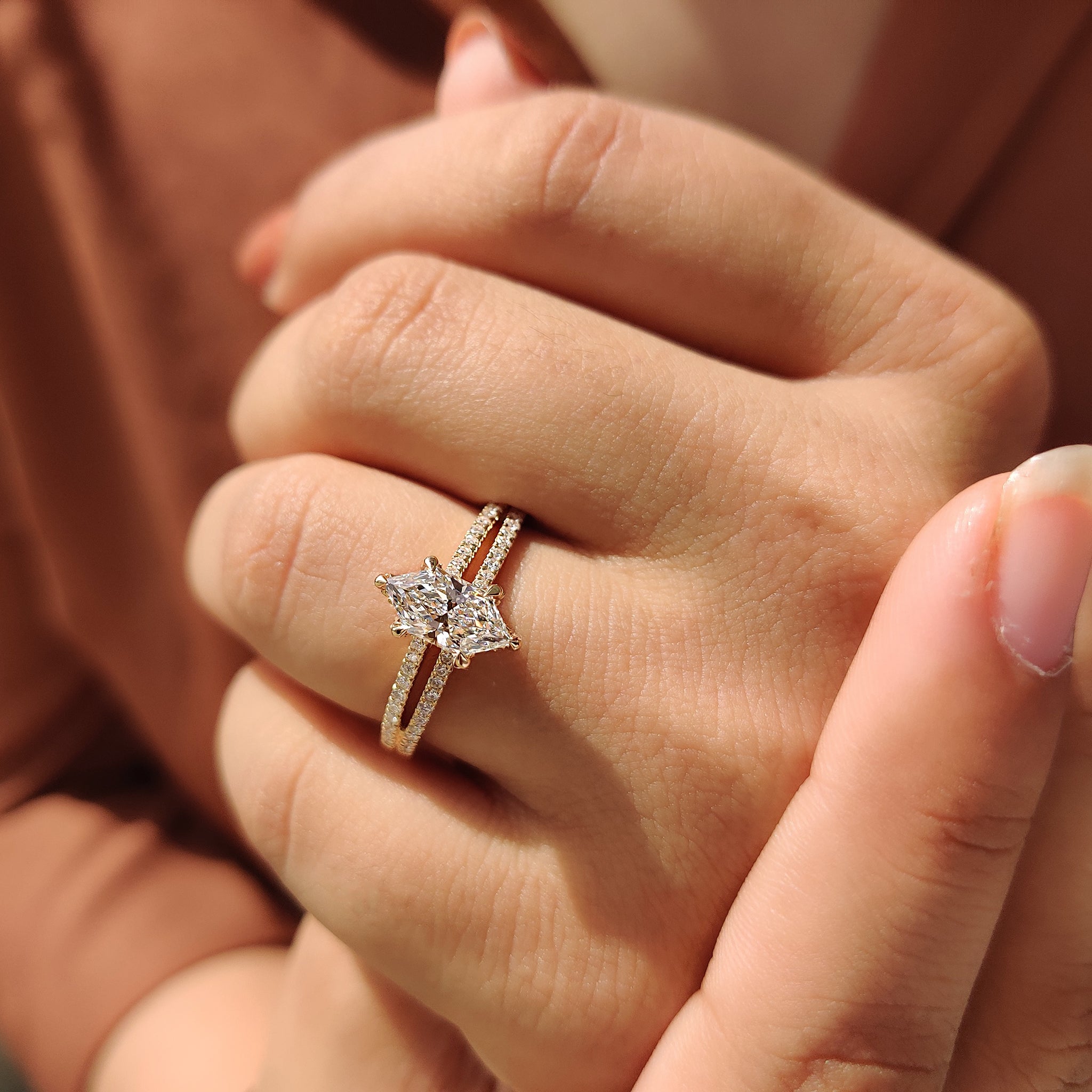 Dutch marquise engagement ring with split shank design.