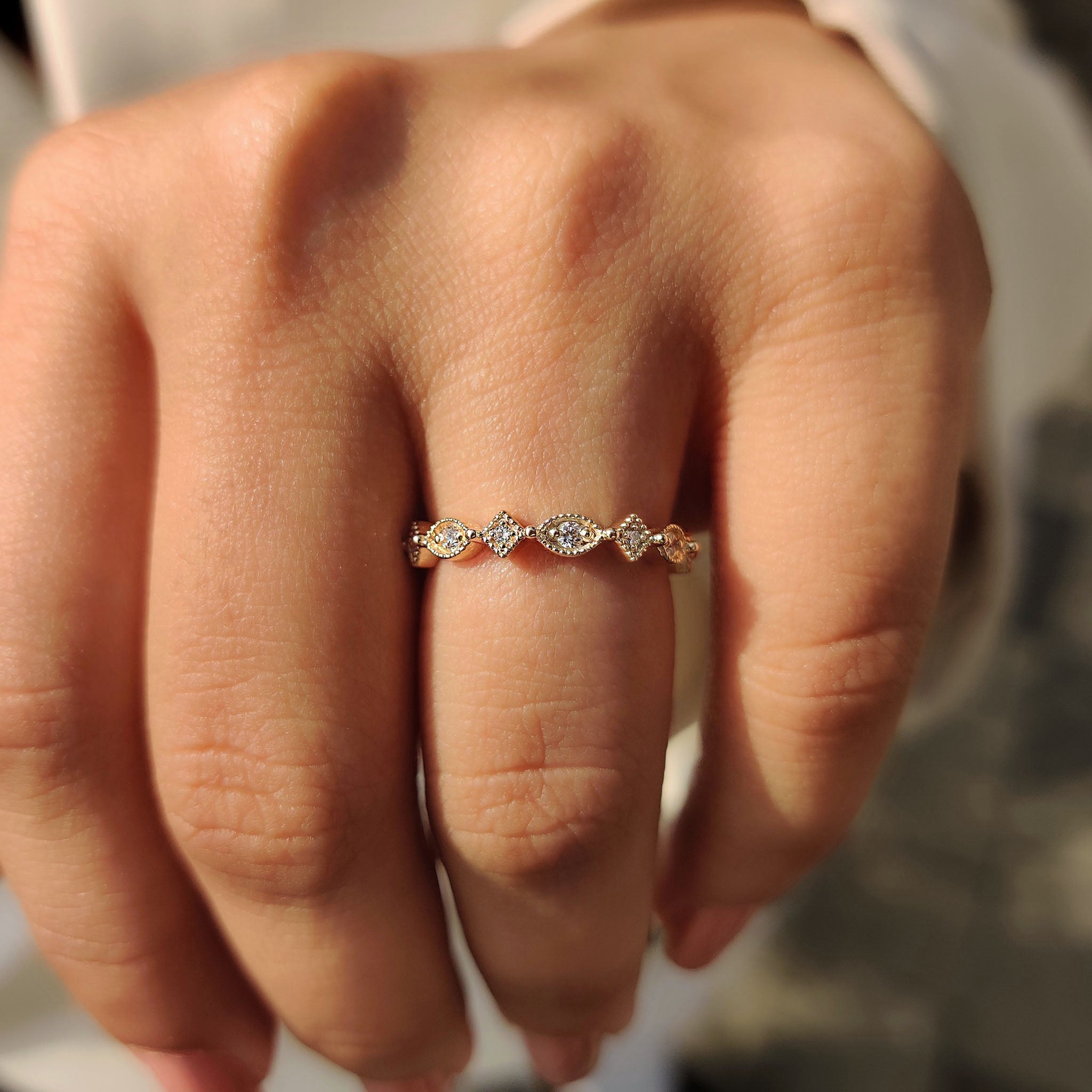 Lab grown diamond wedding band in yellow gold with milgrain and vintage design.
