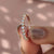 Rose gold anniversary band featuring round-cut diamonds.