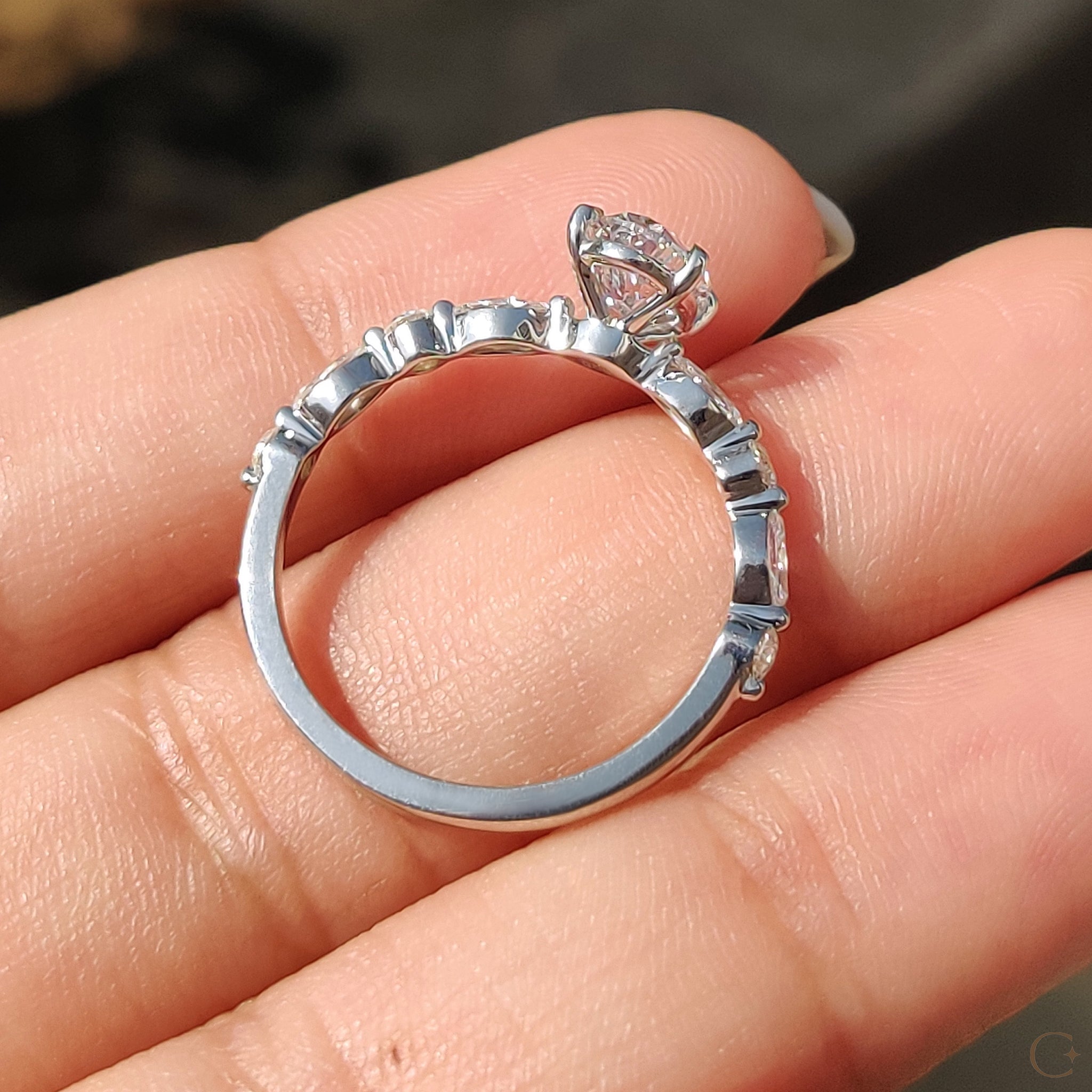 White gold engagement ring with brilliant diamonds.
